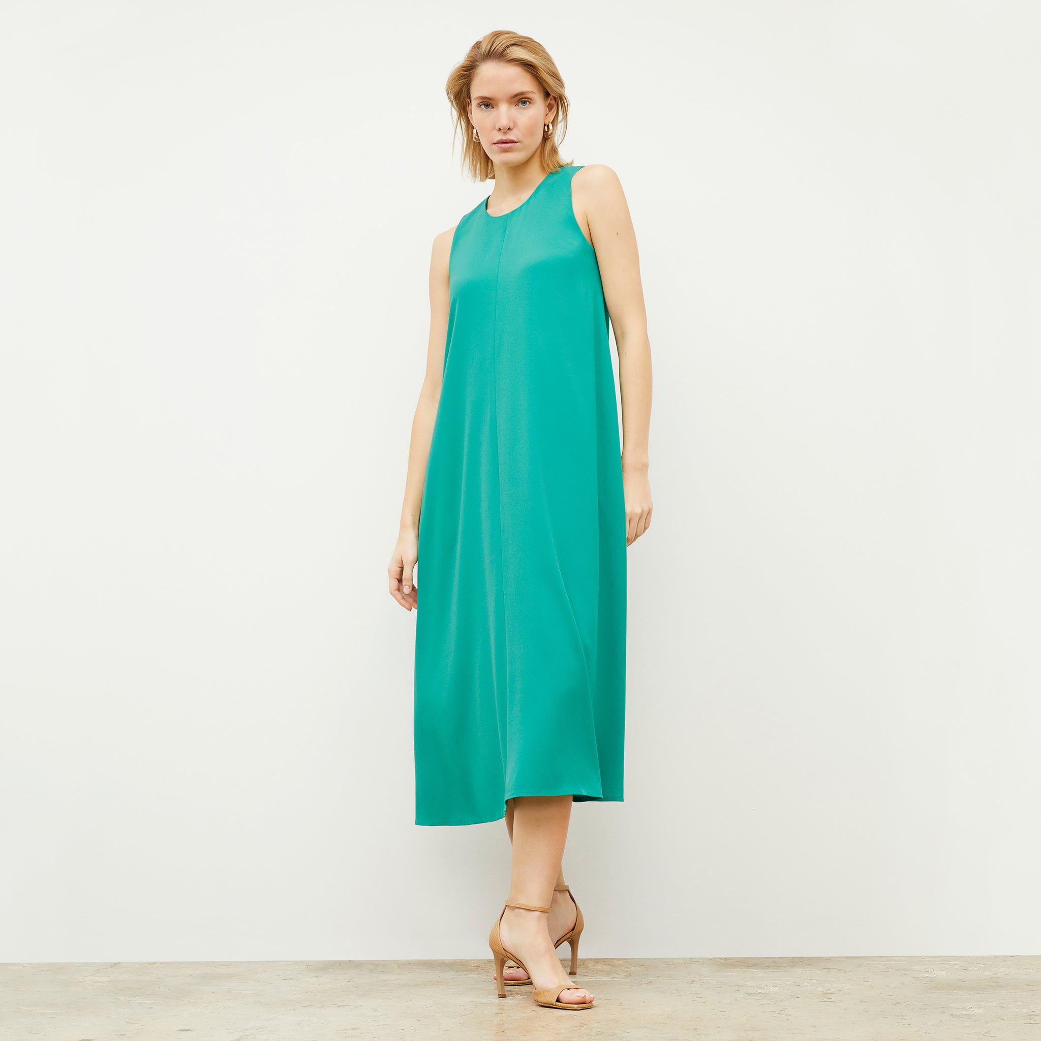 Front image of a woman wearing the Fatima Dress - Eco Heavy Crepe in Tropical Green