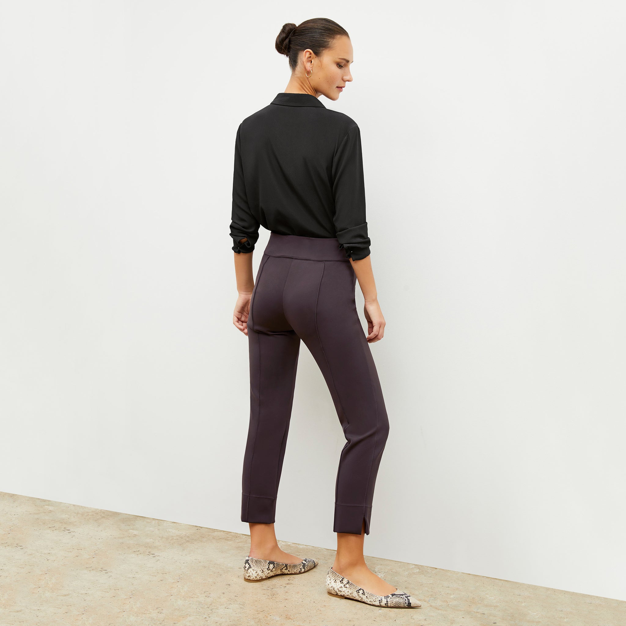 Back image of a woman wearing the robin pant in haze