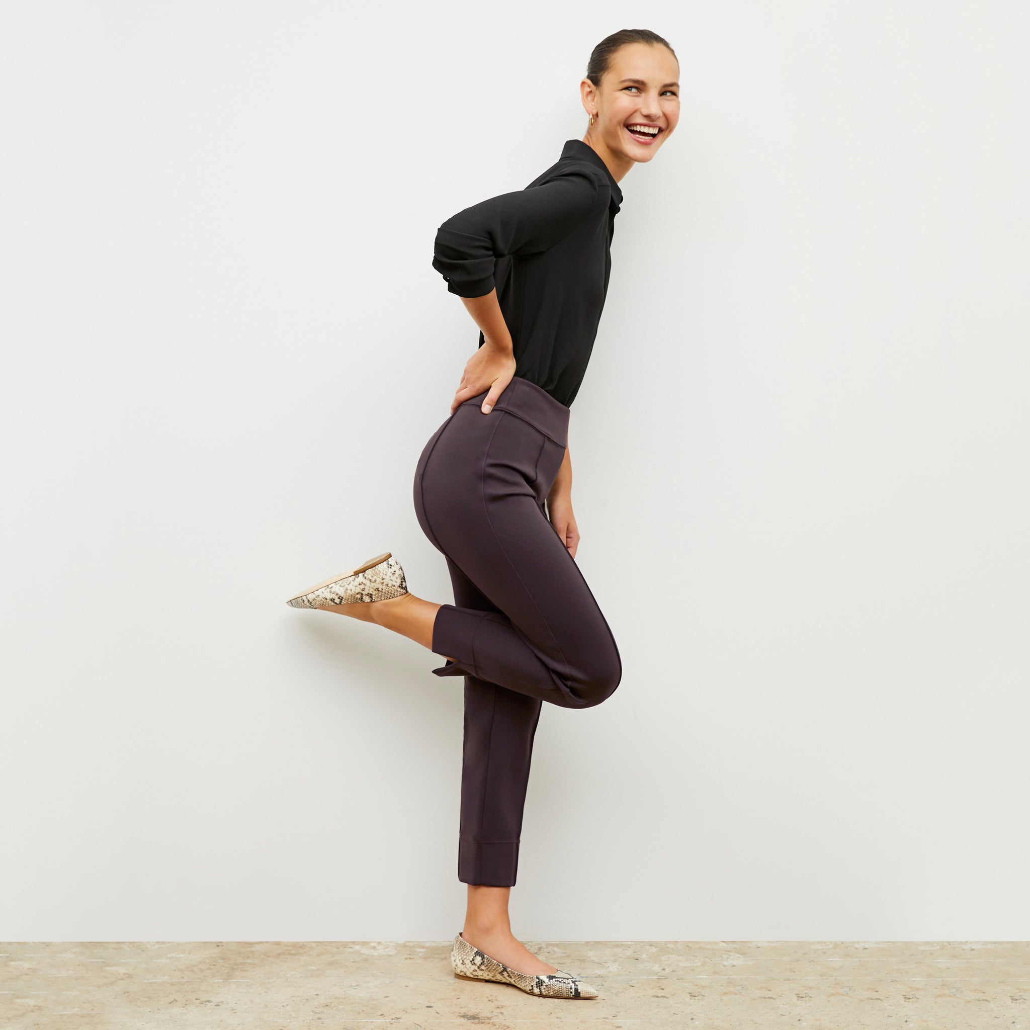 Front image of a woman wearing the robin pant in haze