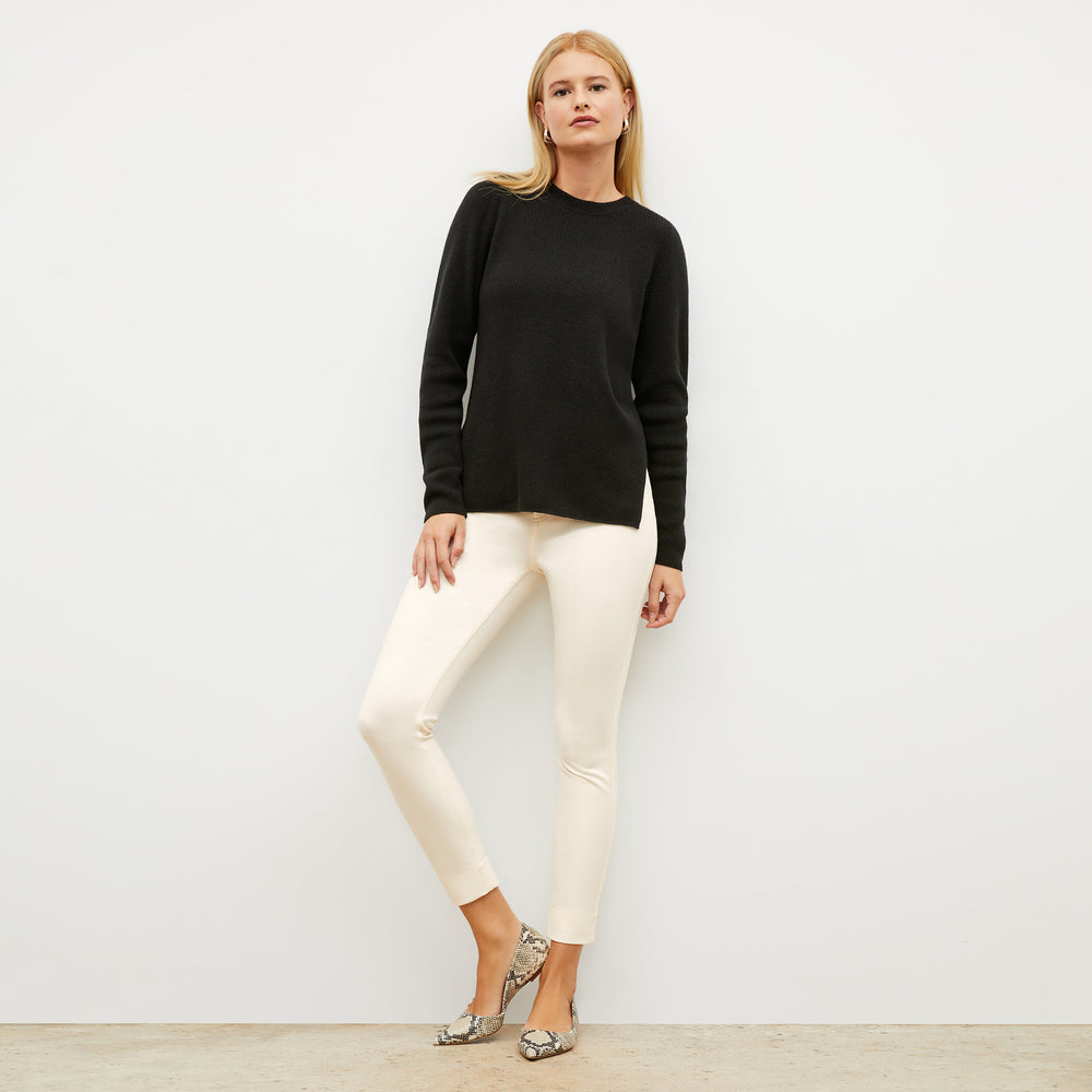 Front image of a woman wearing the Sammataro Jean in Tusk