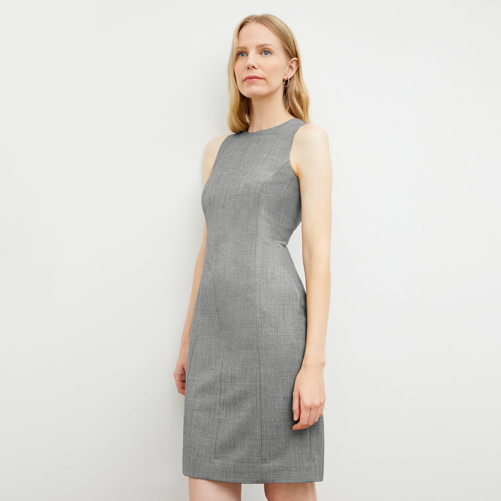 Side image of a woman wearing the constance dress in black and white