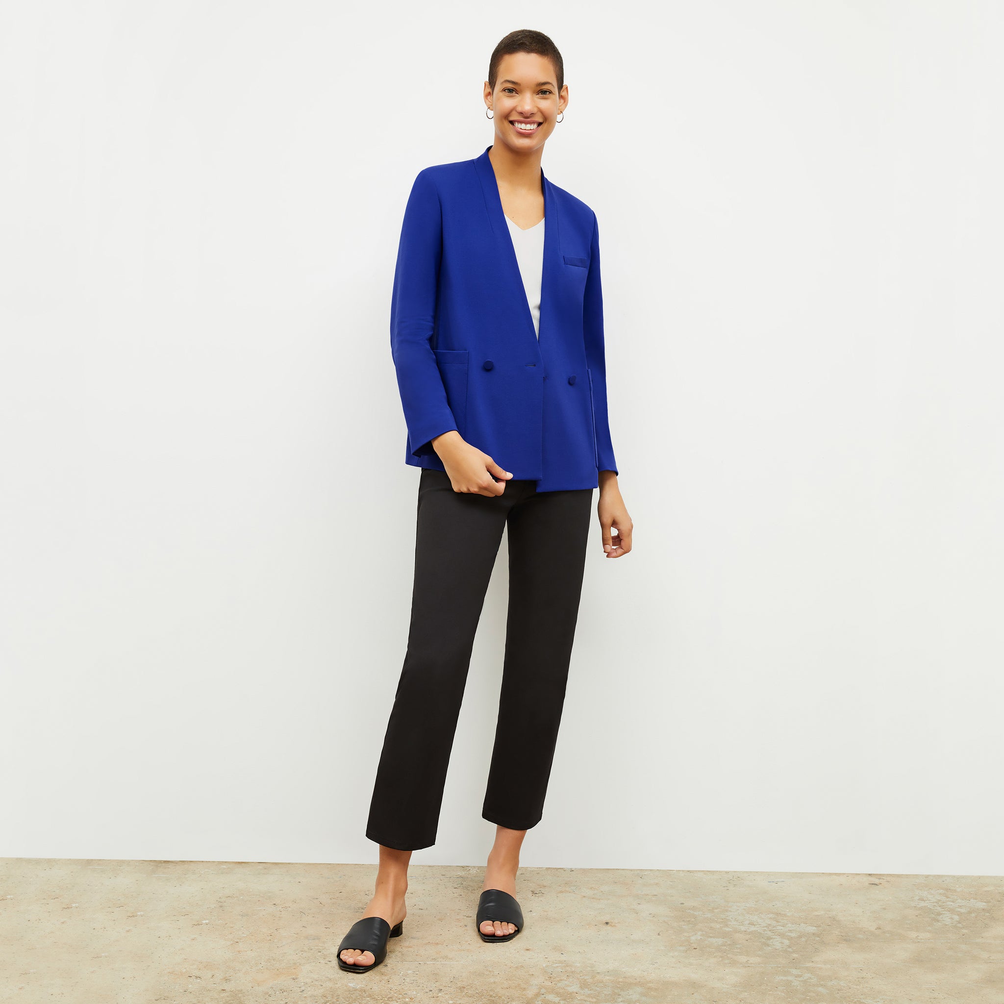 front image of a woman wearing the janette jacket in electric blue 