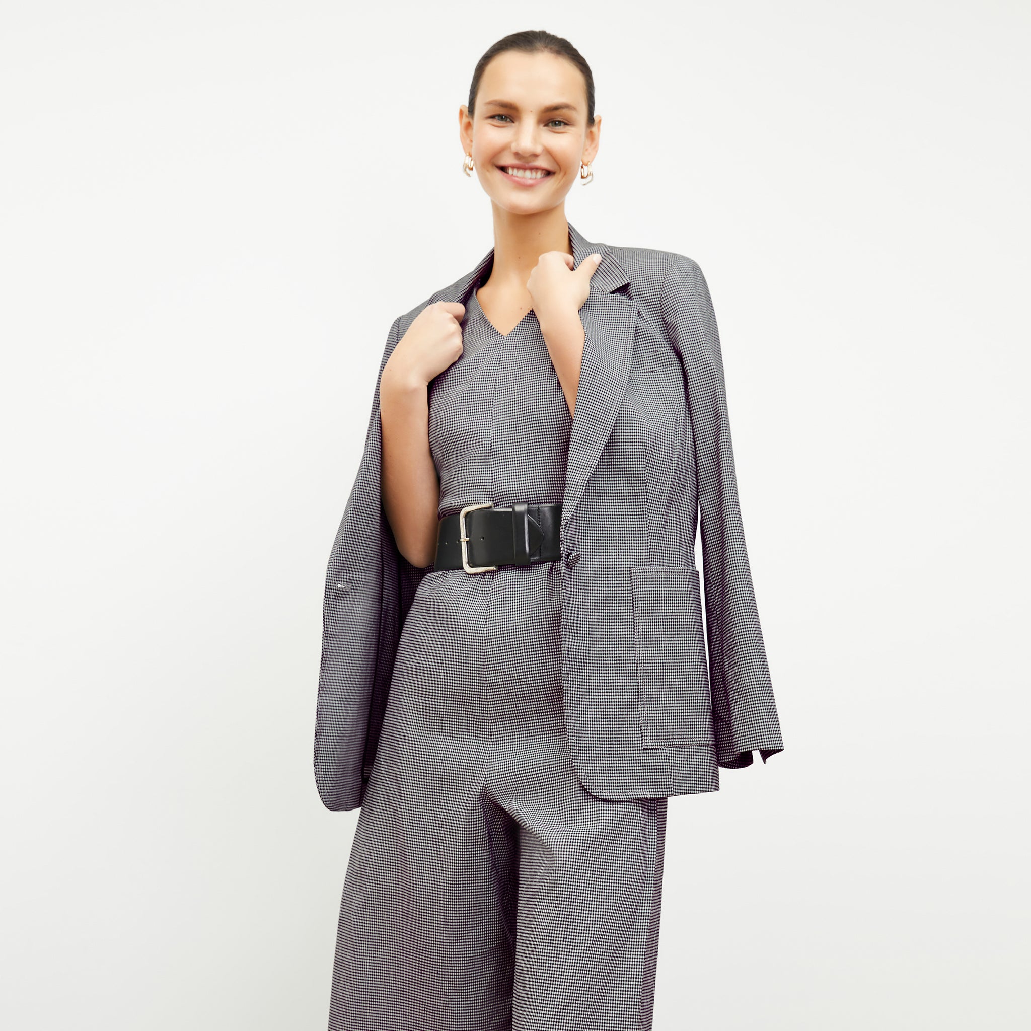 front image of a woman wearing the dolly jacket in gingham linen
