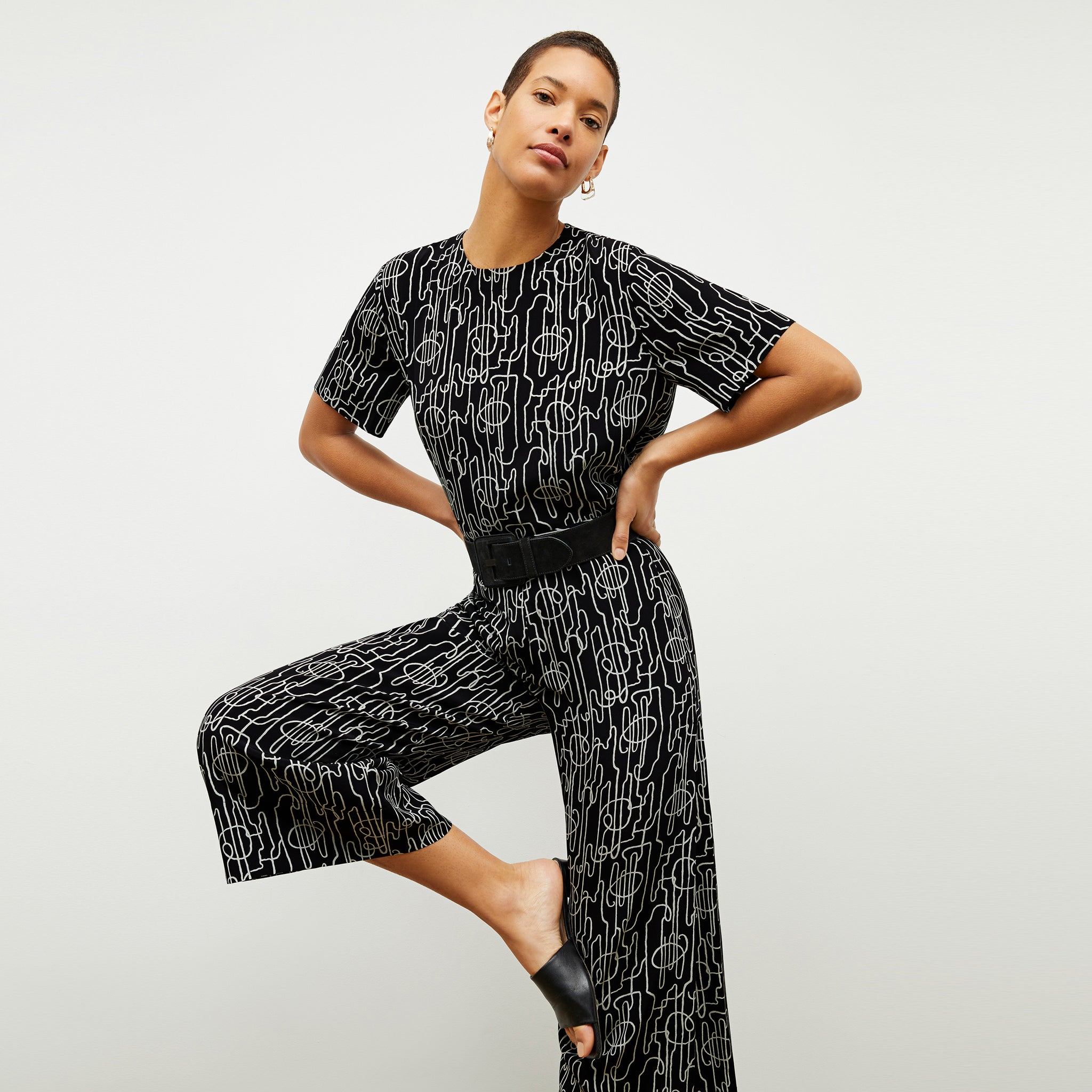 front image of a woman wearing the zhou culotte in symphony print