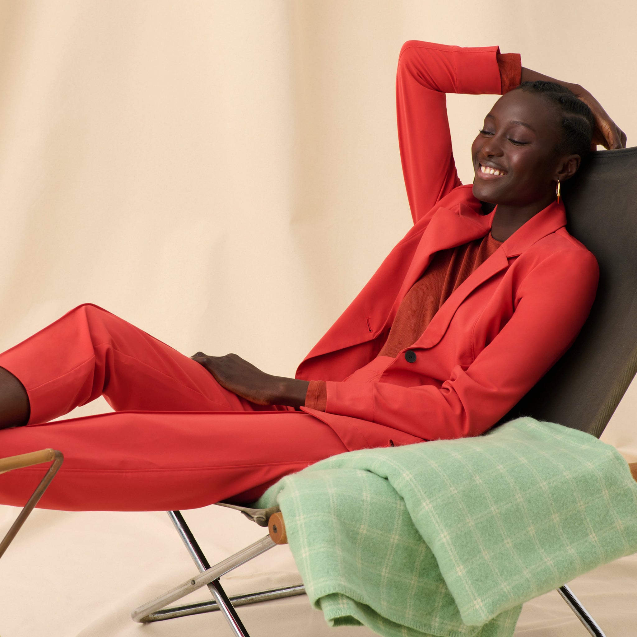 Front image of a woman wearing the Moreland Jacket in Blood Orange