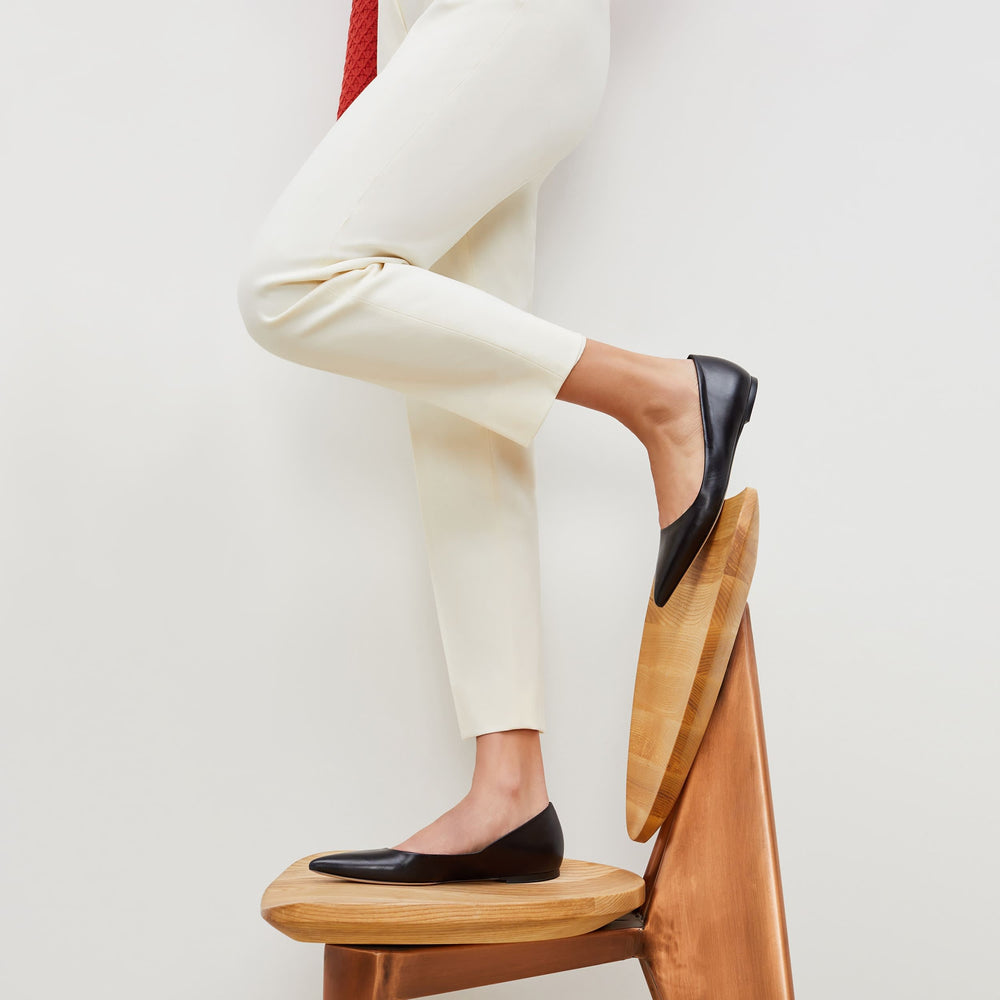woman wearing the rowan flat kidskin in black