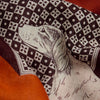 image of a woman wearing the les cheris scarf in red