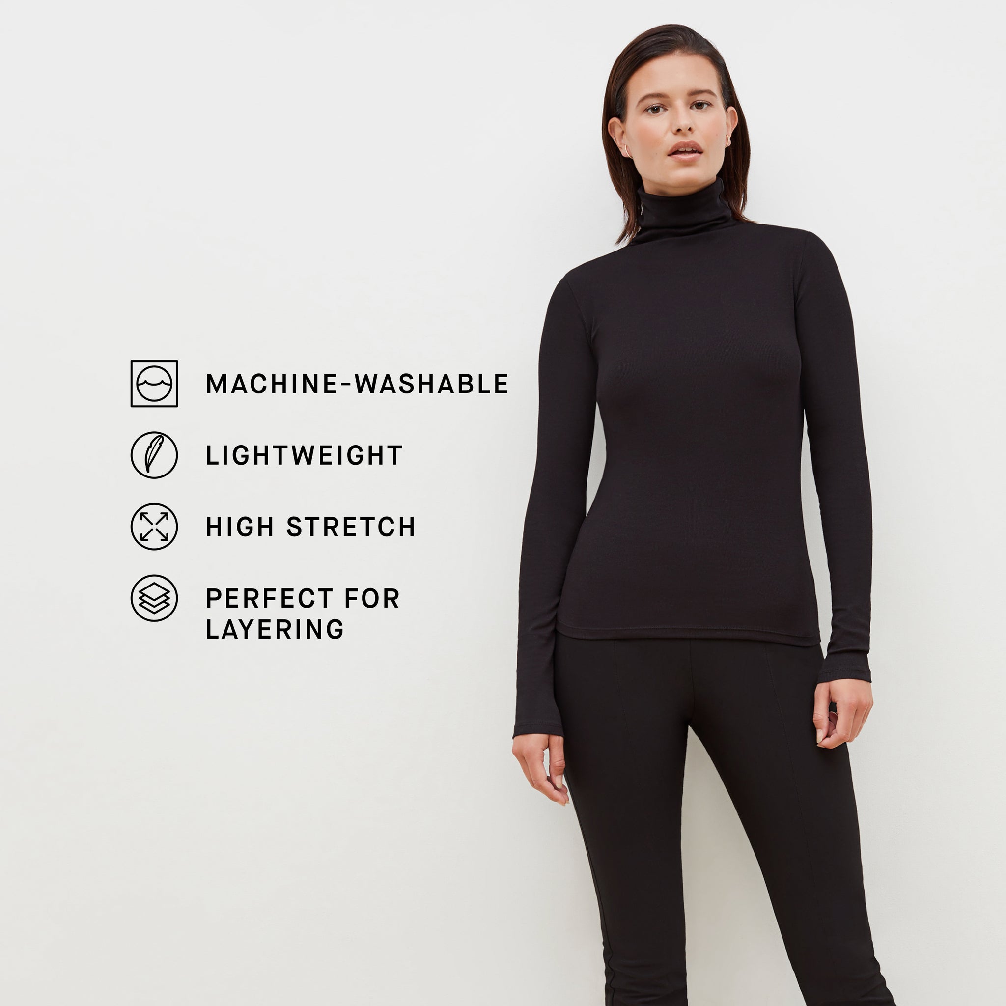 image of a woman wearing the axam t-shirt in black with the product features listed