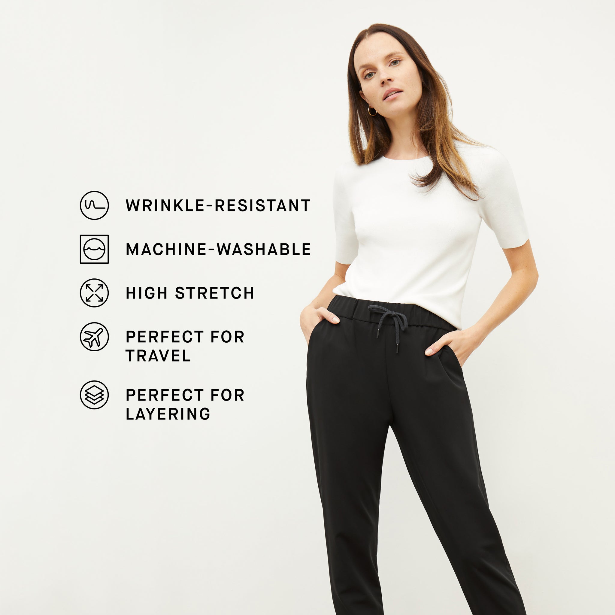 front image of a woman wearing the choe top in ivory with the product features listed