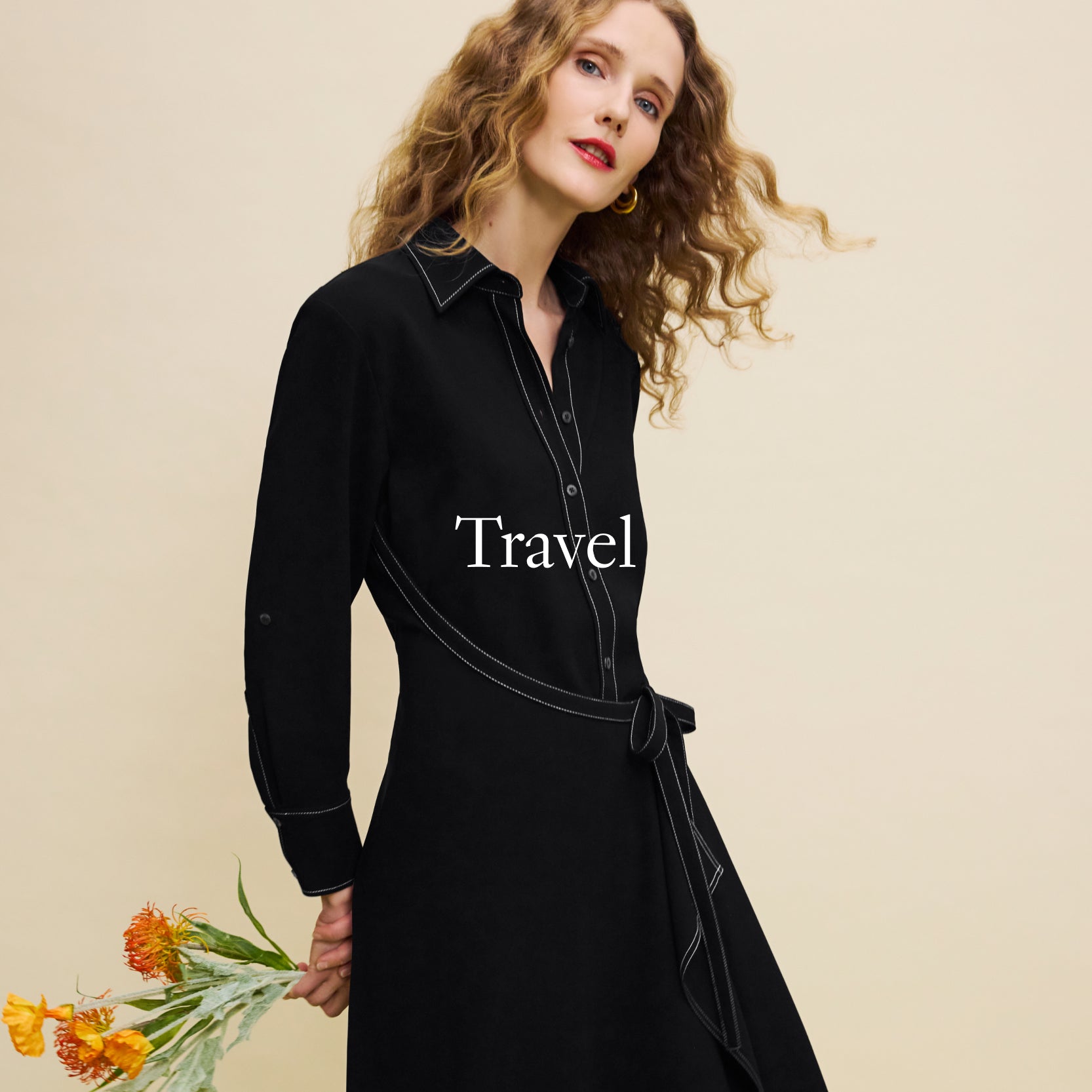 Woman in a black dress holding flowers with 'Travel' text on a beige background