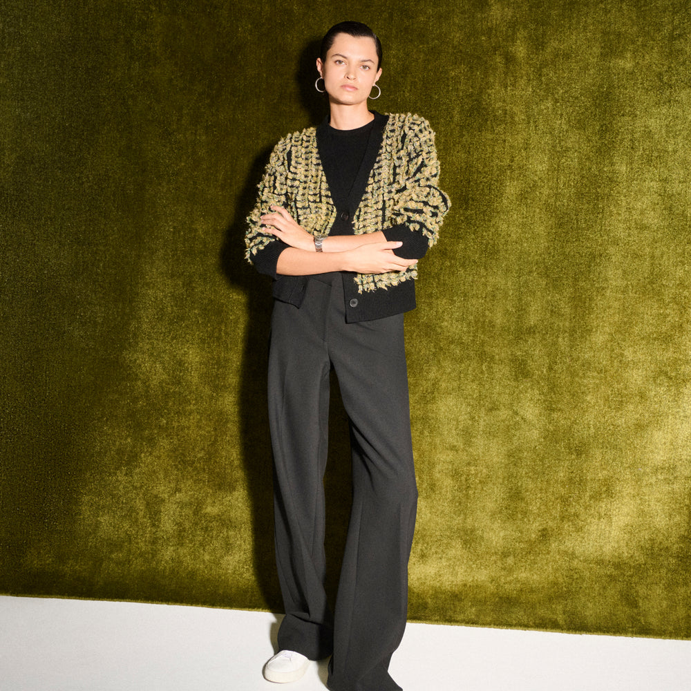 front image of the rayna sweater in pom pom knit