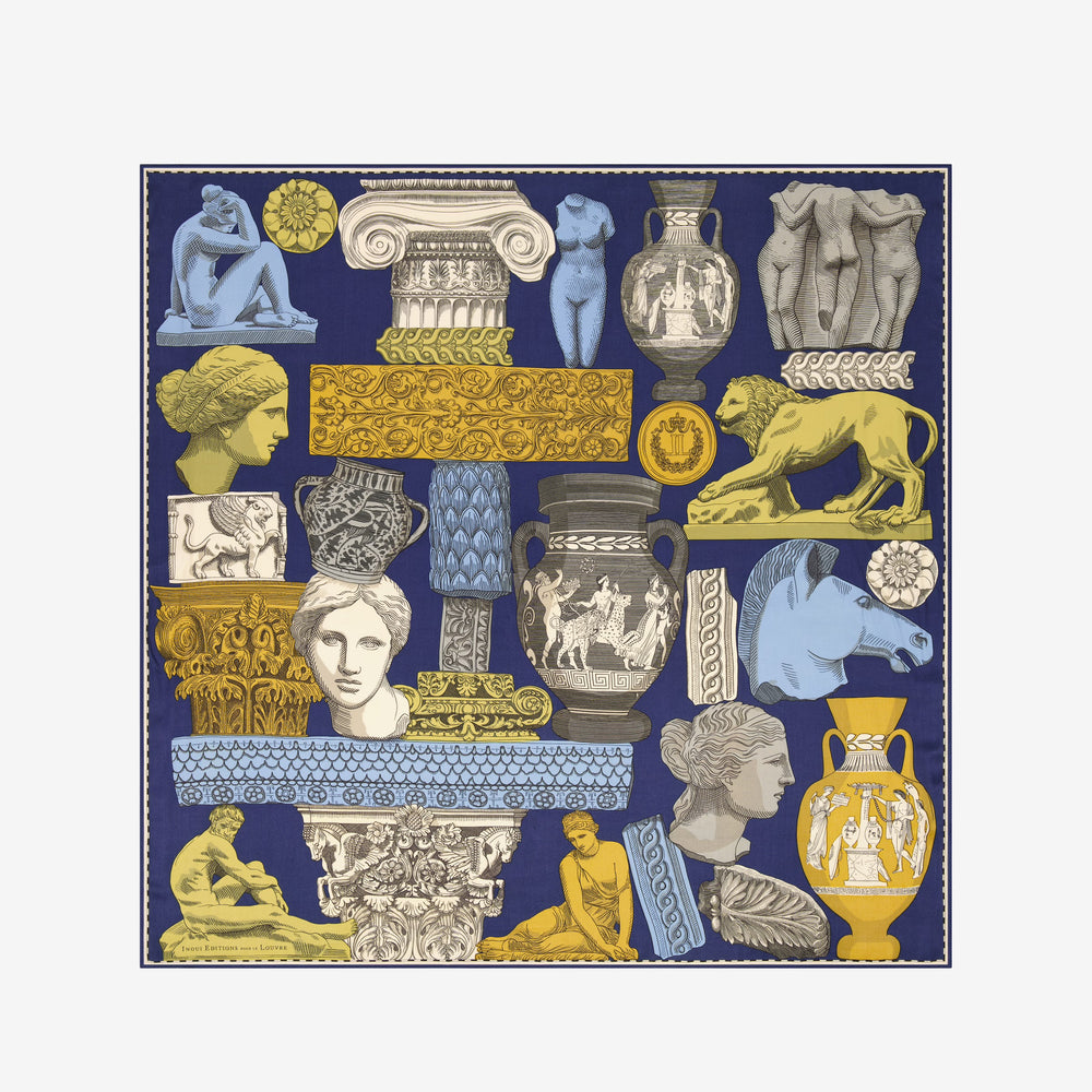 Collection of classical sculptures and architectural elements on a blue background