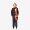 image of a man wearing the les cheris scarf in red