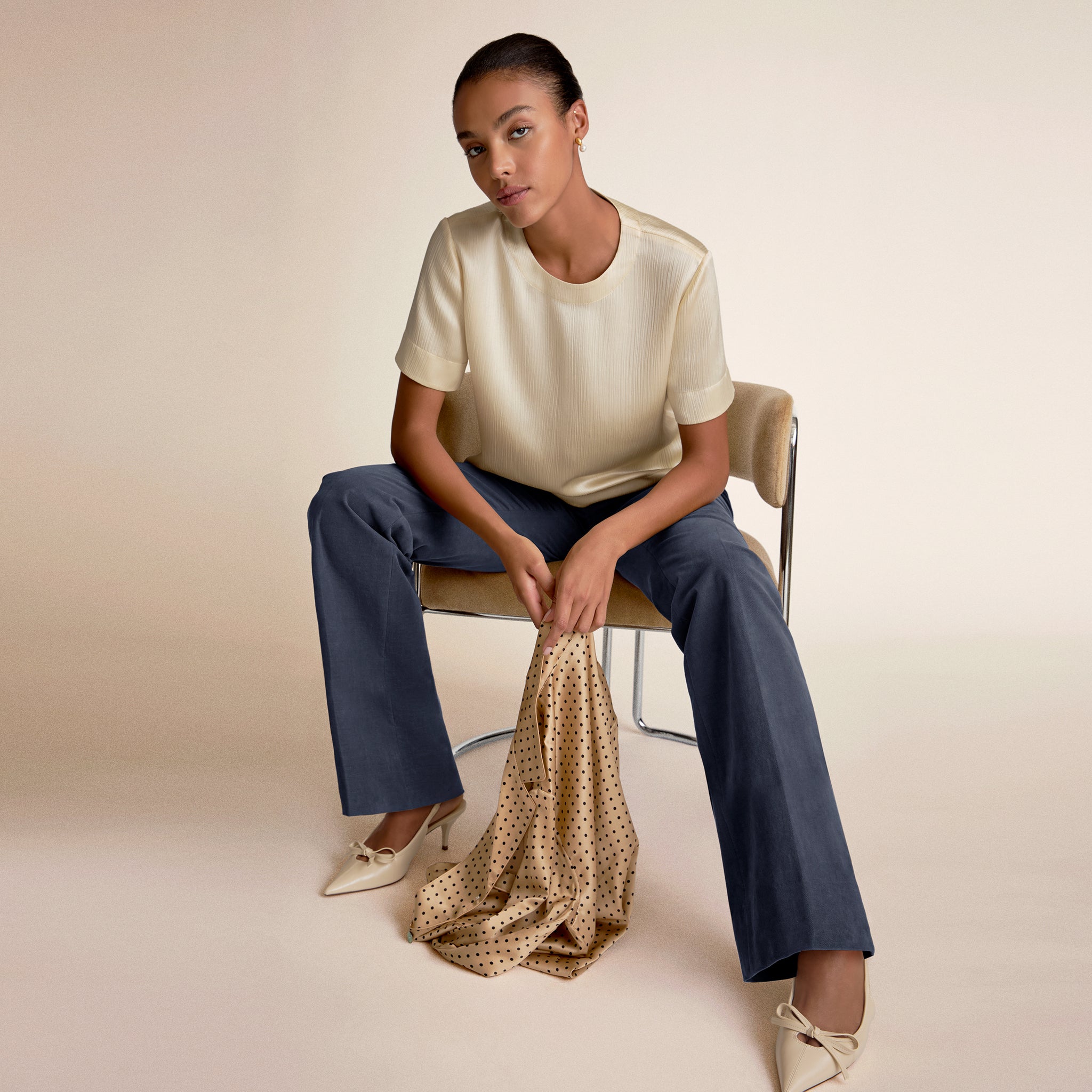 Woman wearing Didion Top in Ivory