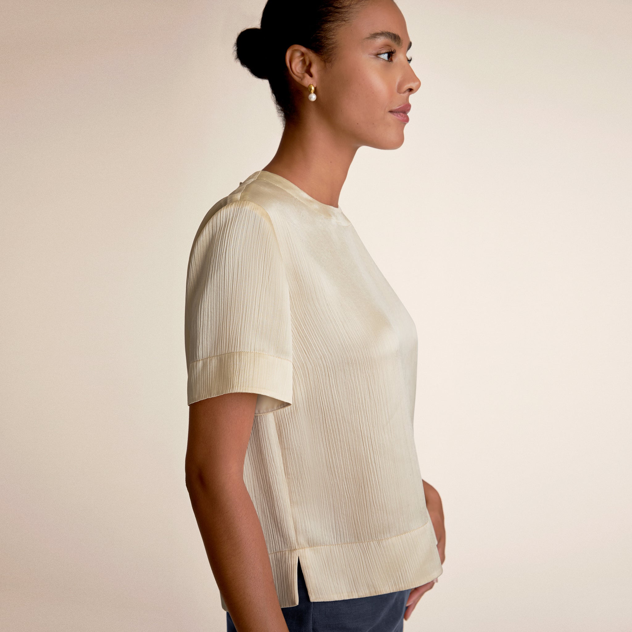 Woman wearing Didion Top in Ivory