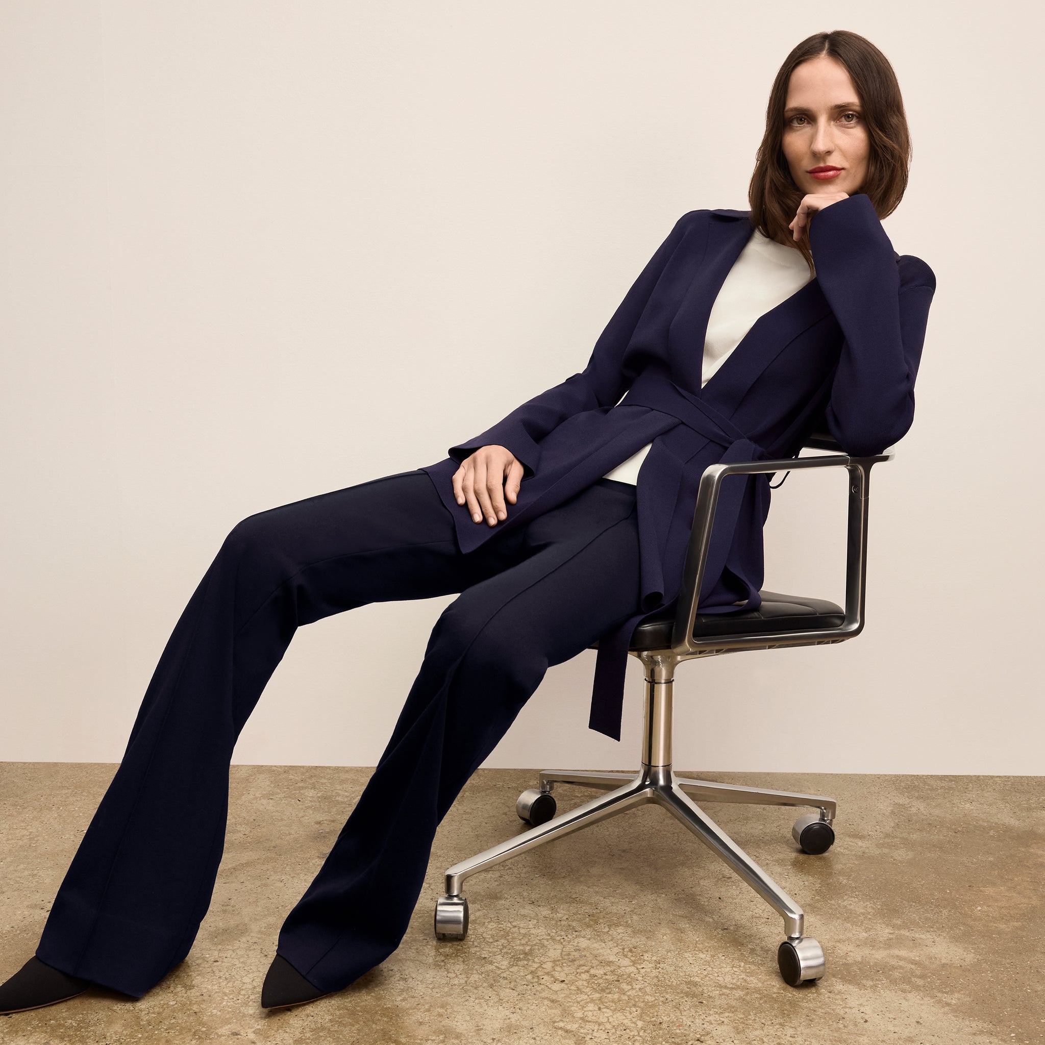 image of a woman wearing the merritt jardigan in navy