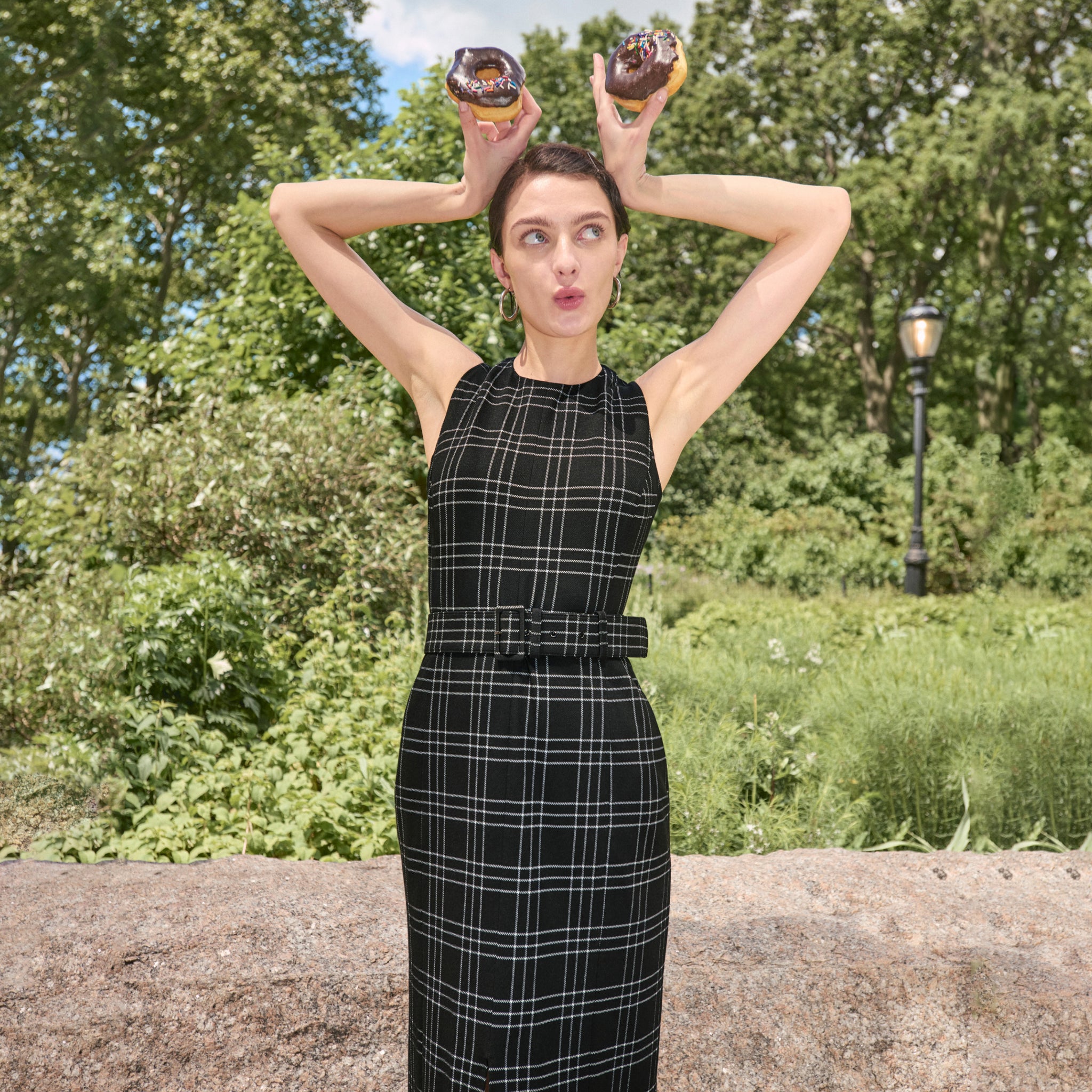 front image of a woman wearing the ashtin dress in black/white