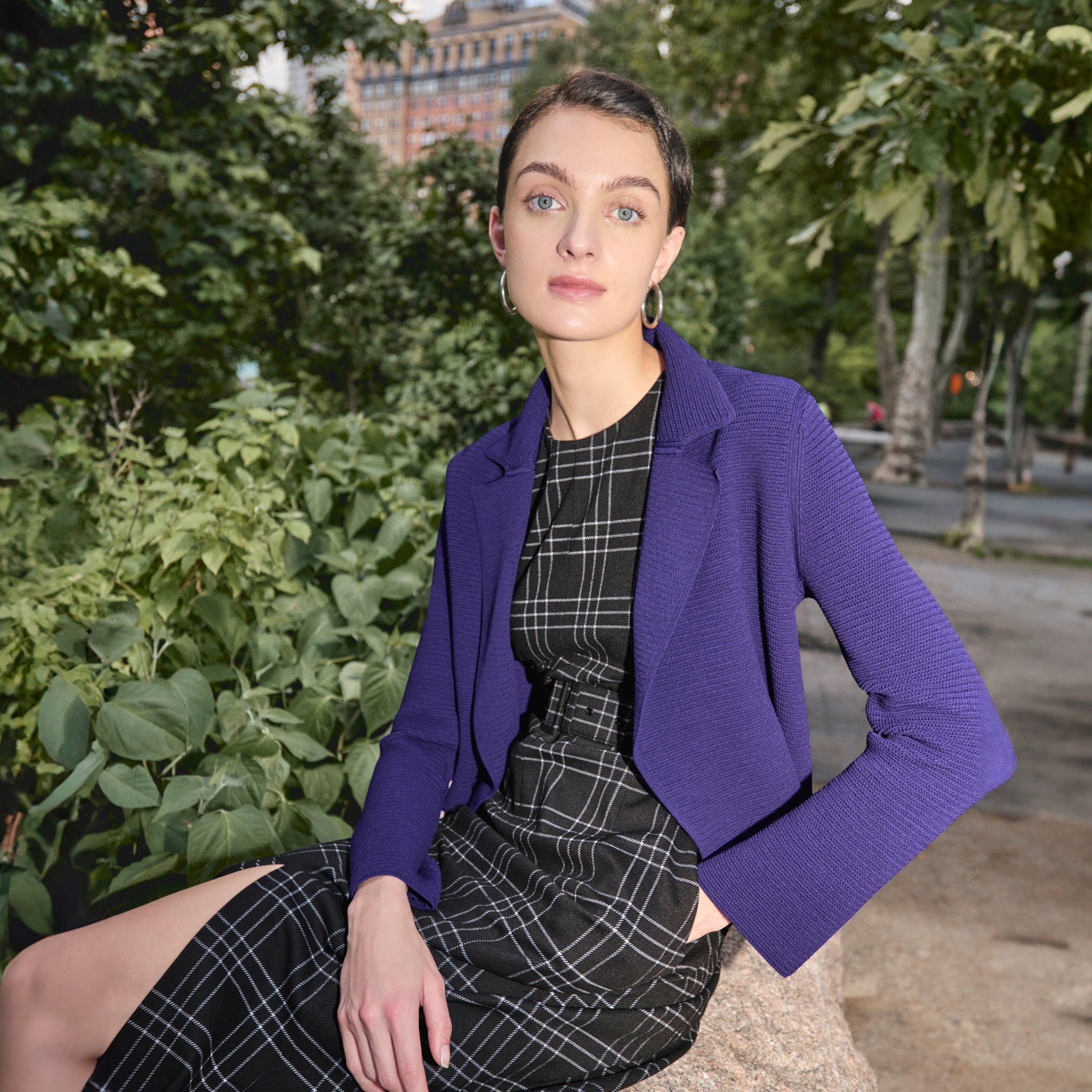 front image of a woman wearing the textured jolie jardigan in amethyst 