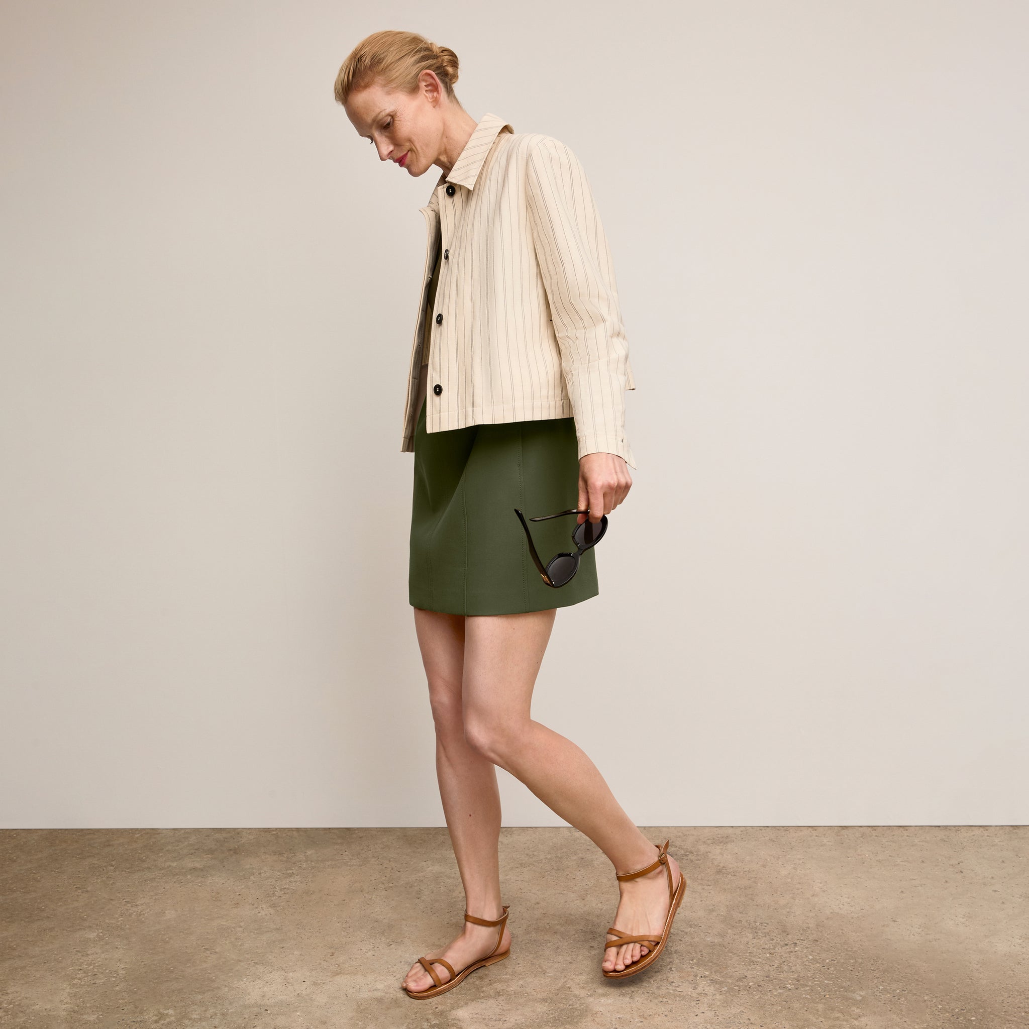 Front image of a woman wearing 
The Carolina Dress-Flex Suiting :: Bright Olive