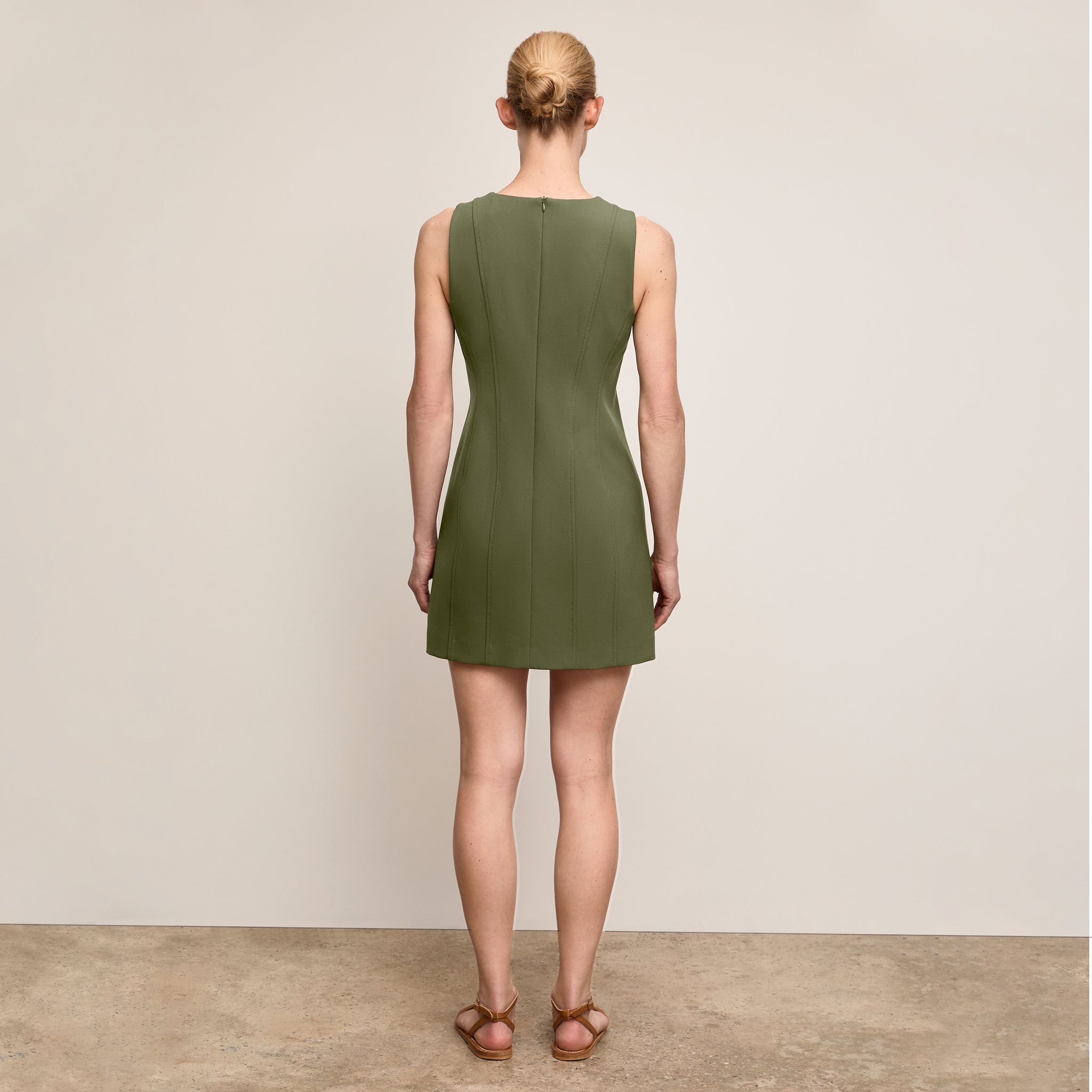 Backimage of a woman wearing 
The Carolina Dress-Flex Suiting :: Bright Olive