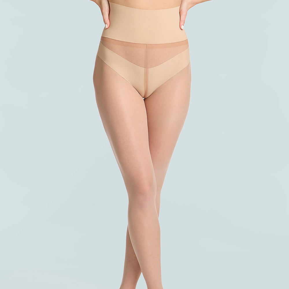 Beige sheer tights worn by a model on a light gray background