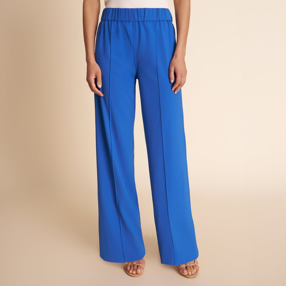 Blue pants on a beige background