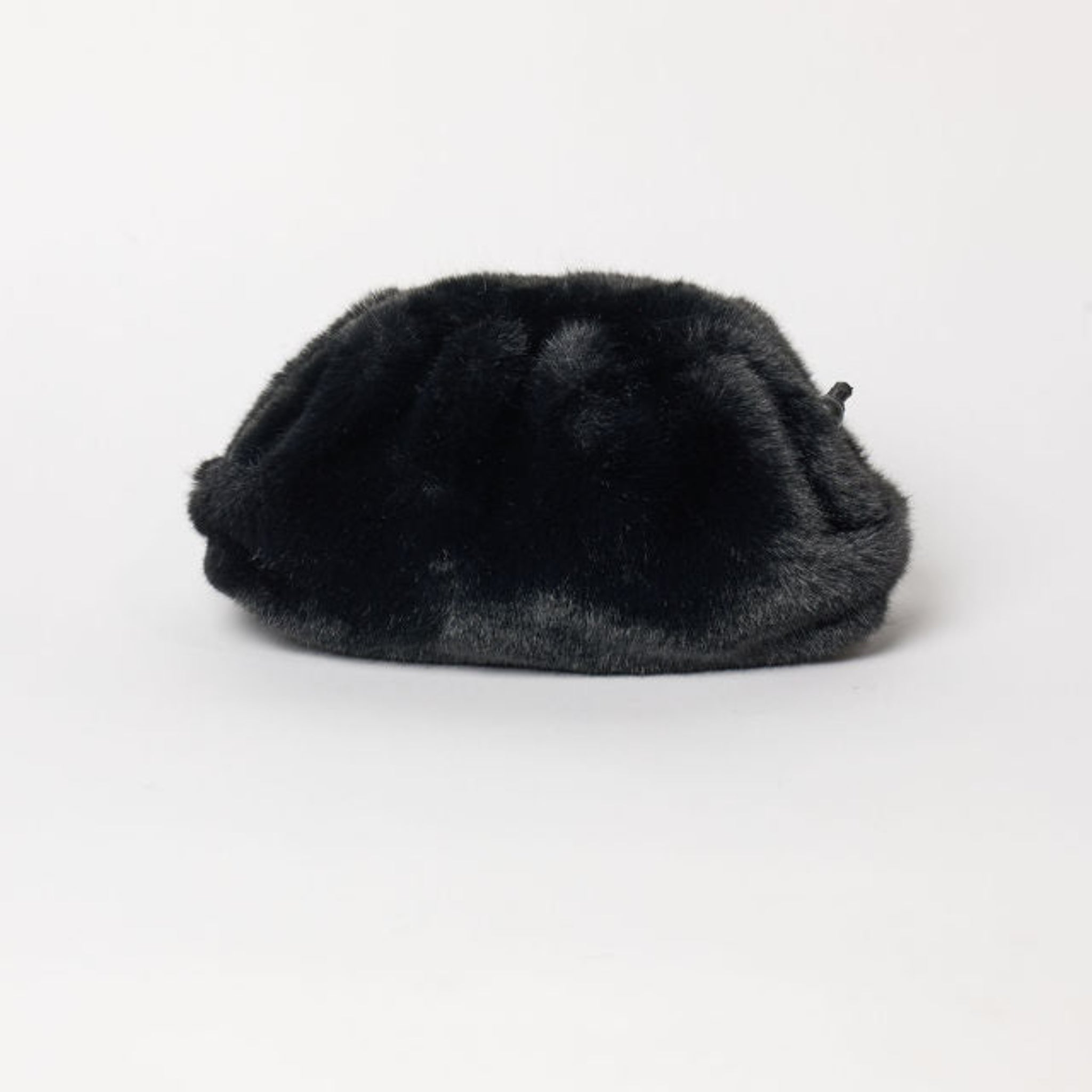 Black fur bag on a white background