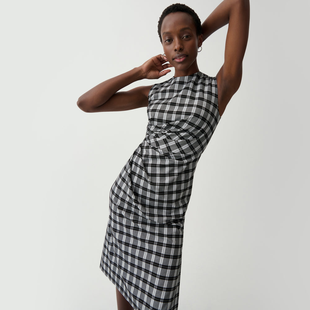 front image of a woman wearing the jeannine dress in checkmate