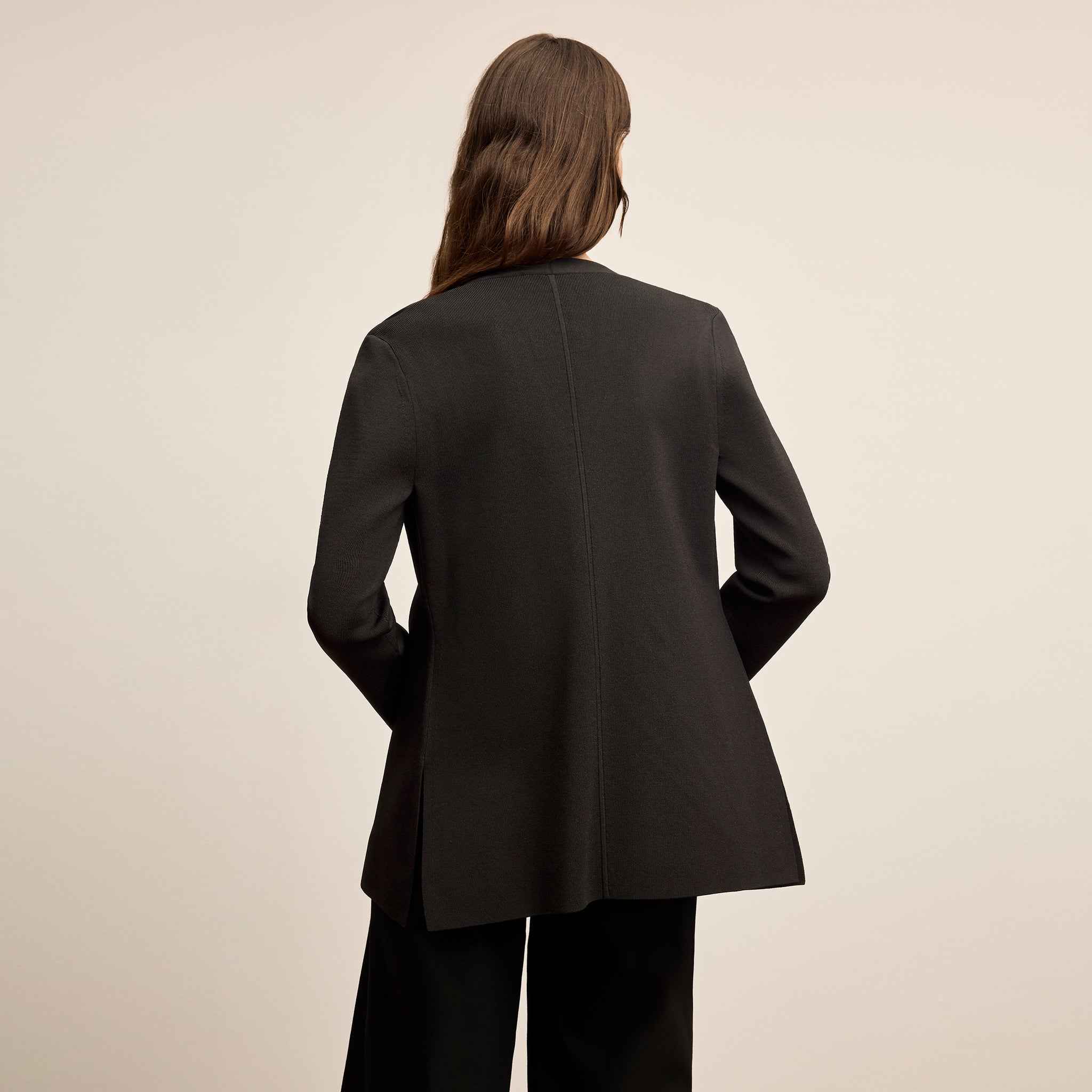 Woman wearing black Jennimai Jardigan