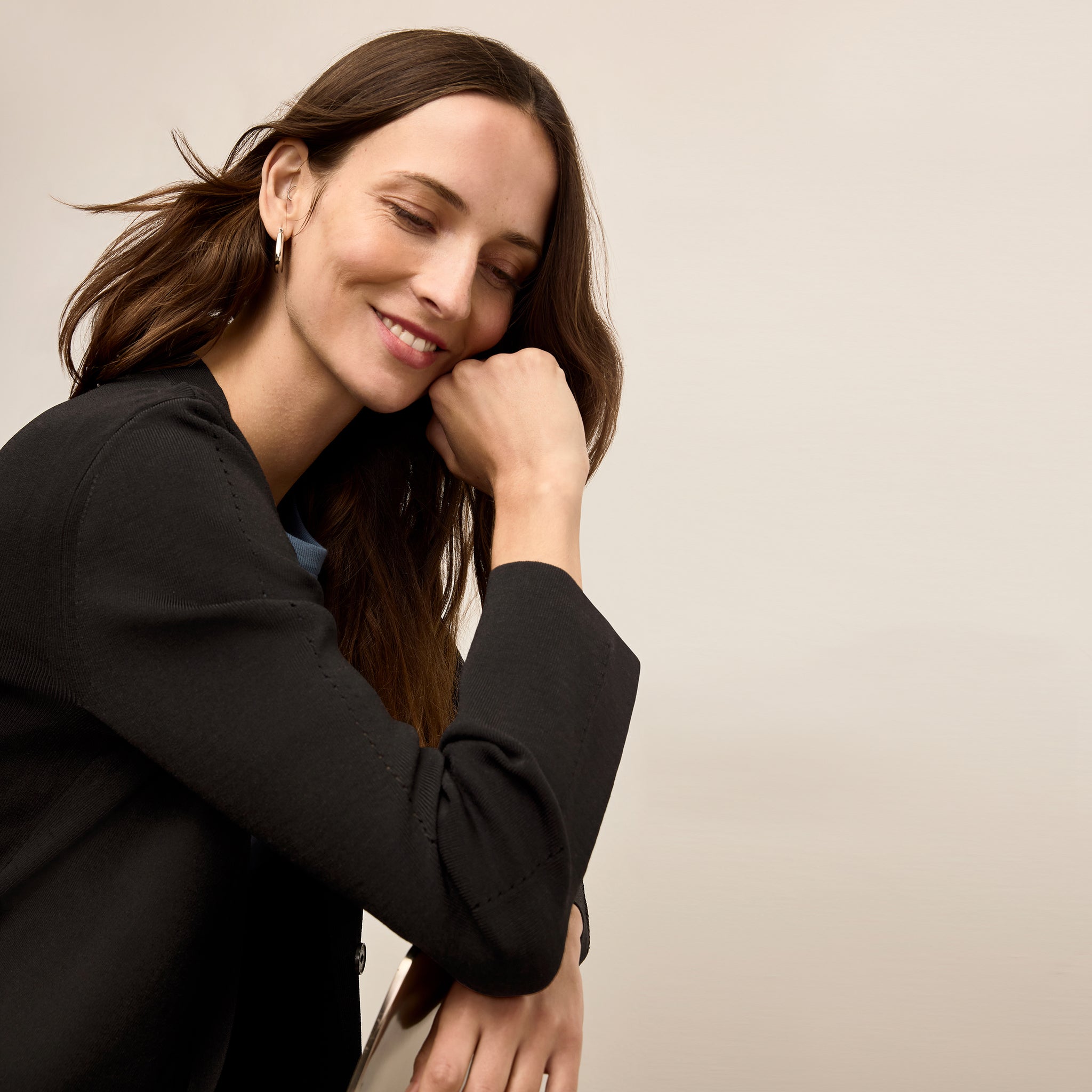 Woman wearing black Jennimai Jardigan