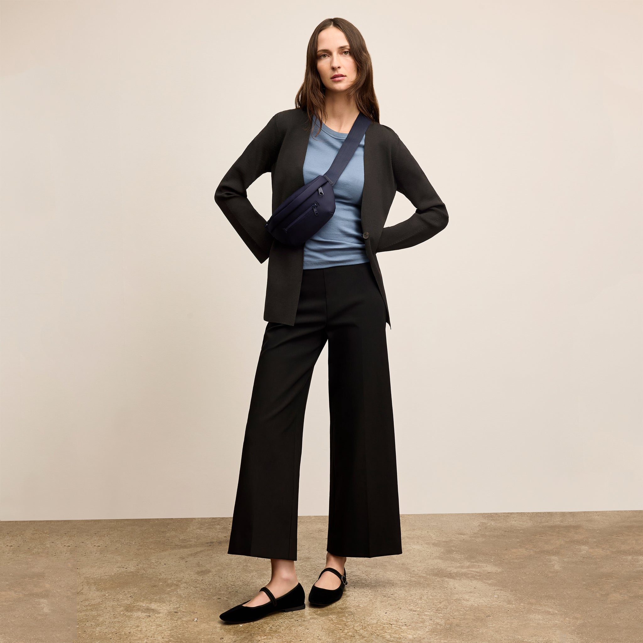 Woman wearing black Jennimai Jardigan