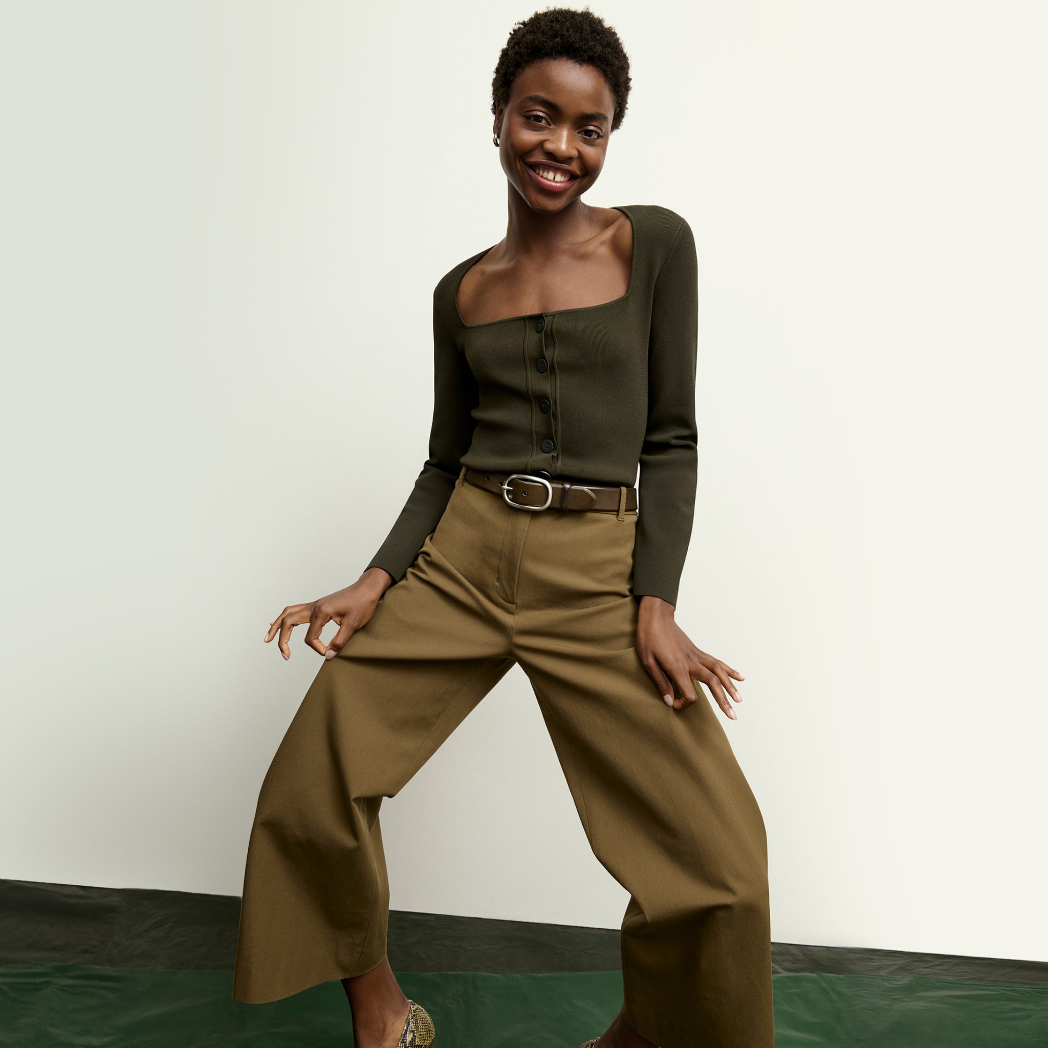 front image of a woman wearing the abby pant in oregano