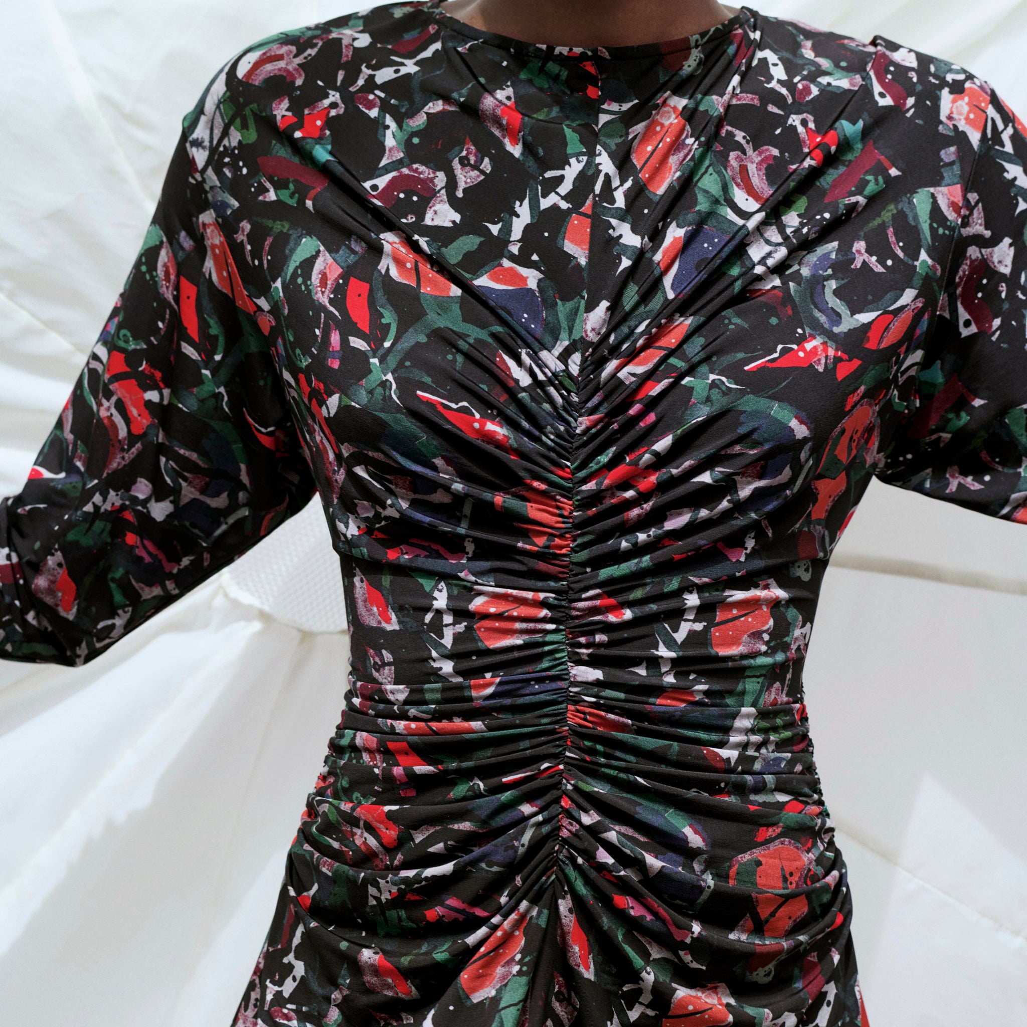 front image of a woman wearing the johnna dress in splatter pop