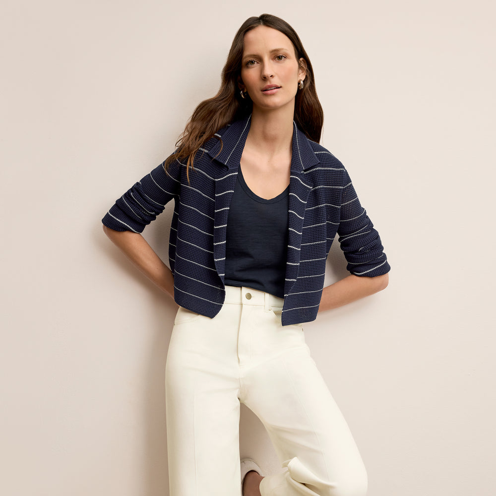 front image of a woman wearing the jolie jardigan in dot knit