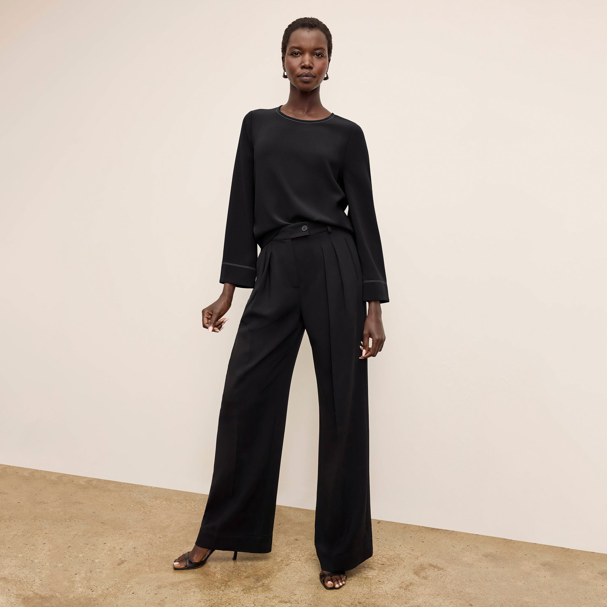 front image of a woman wearing the bia pants in black