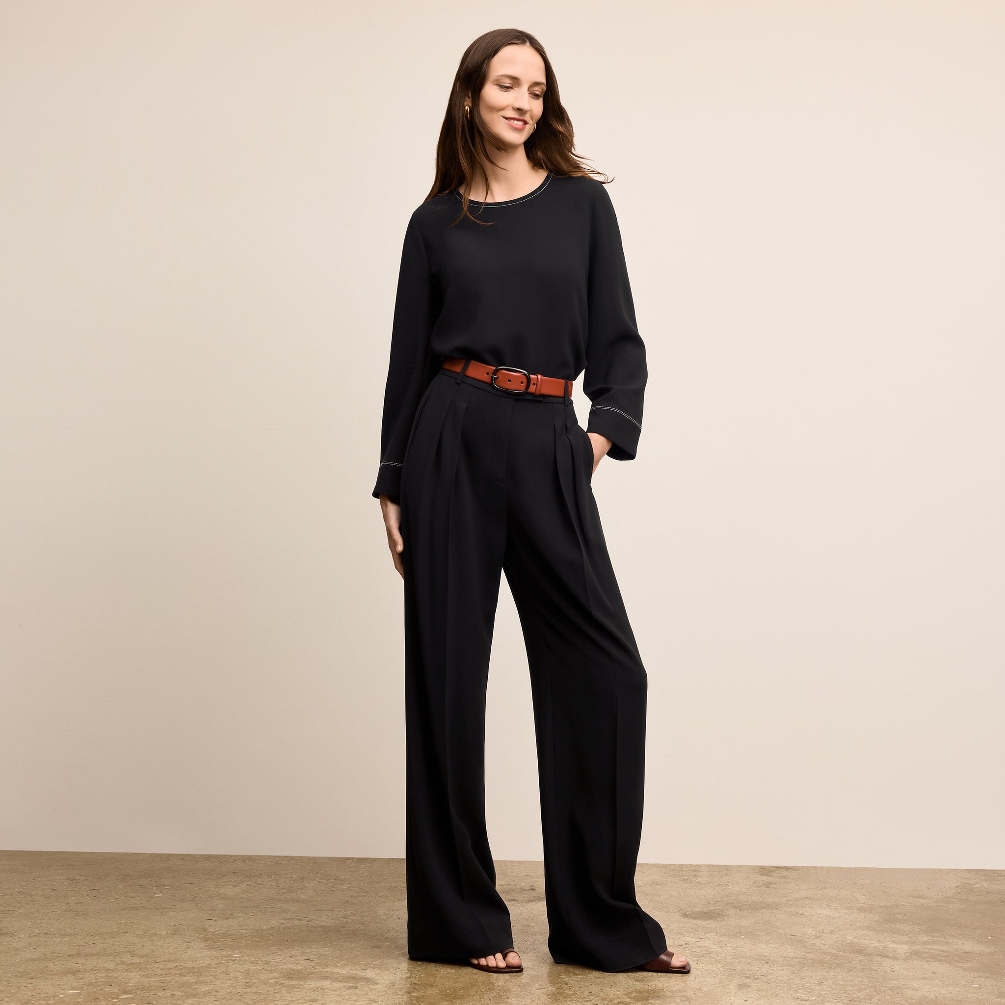 front image of a woman wearing the bia pants in black