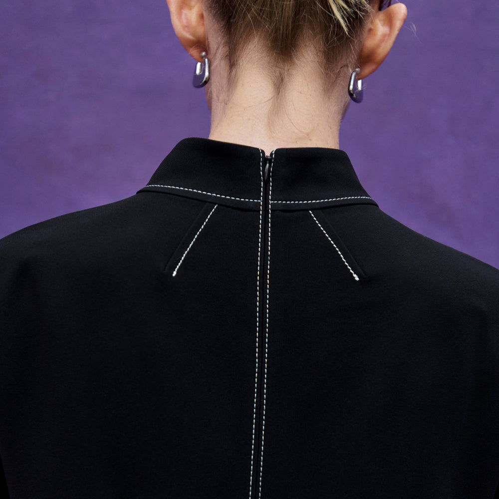 image of a woman wearing the kinsley dress in black