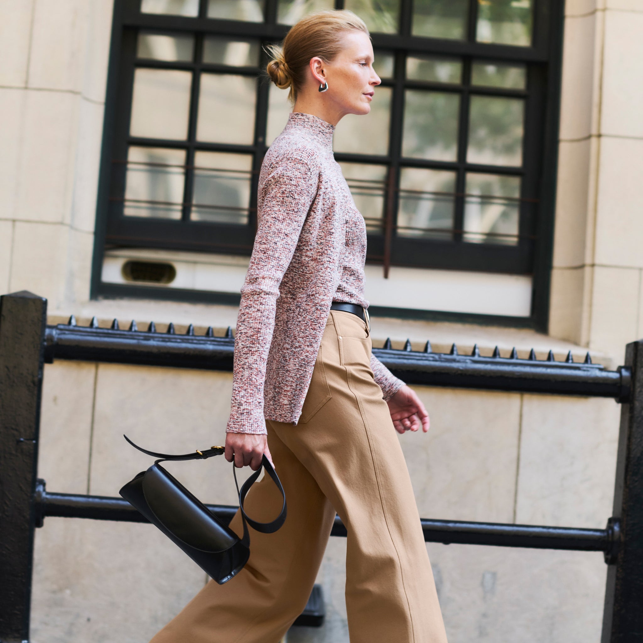 side image of a woman wearing the Kiko Cardigan in Space Dye Rib Knit Brown Multi