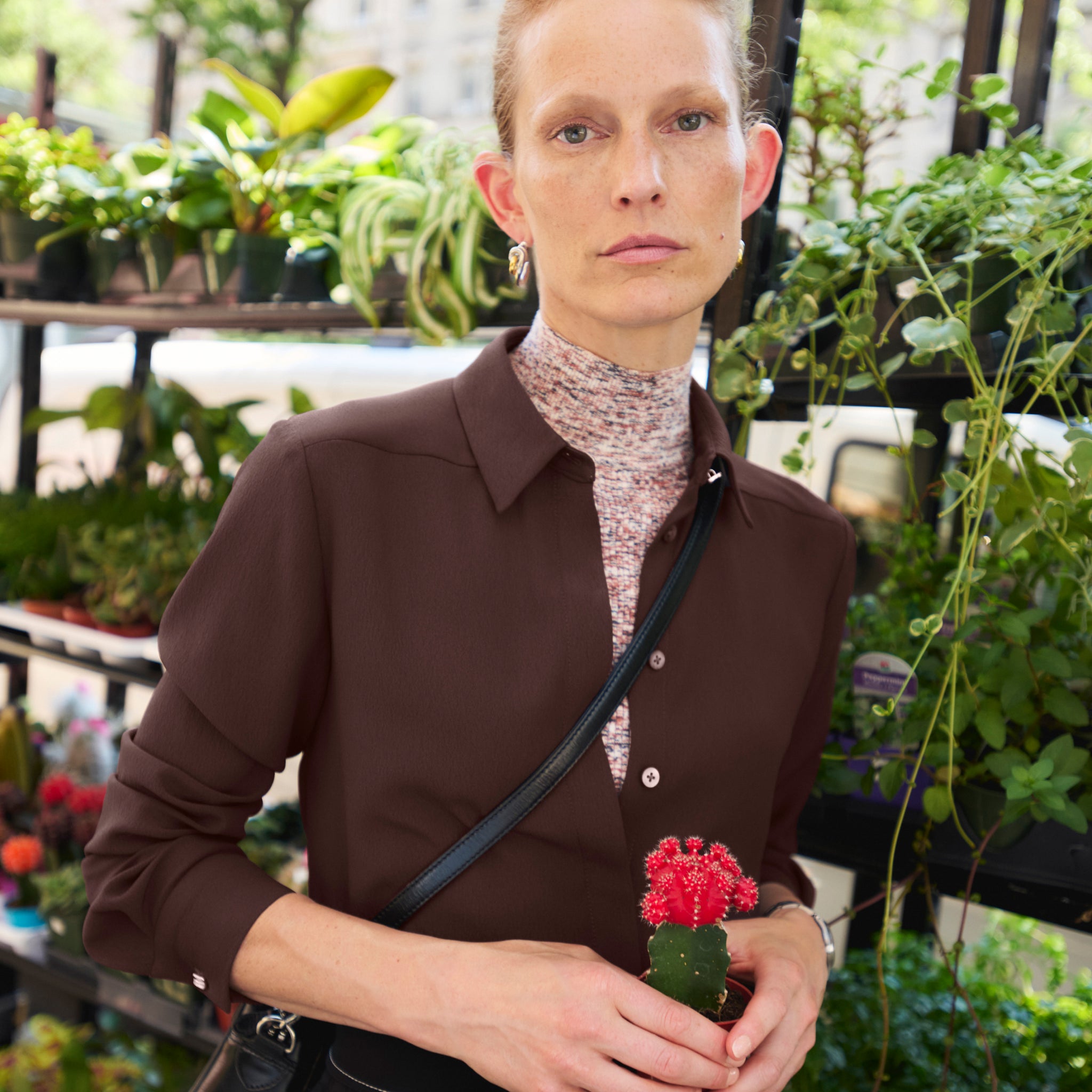 image of a woman wearing the lagarde top in espresso