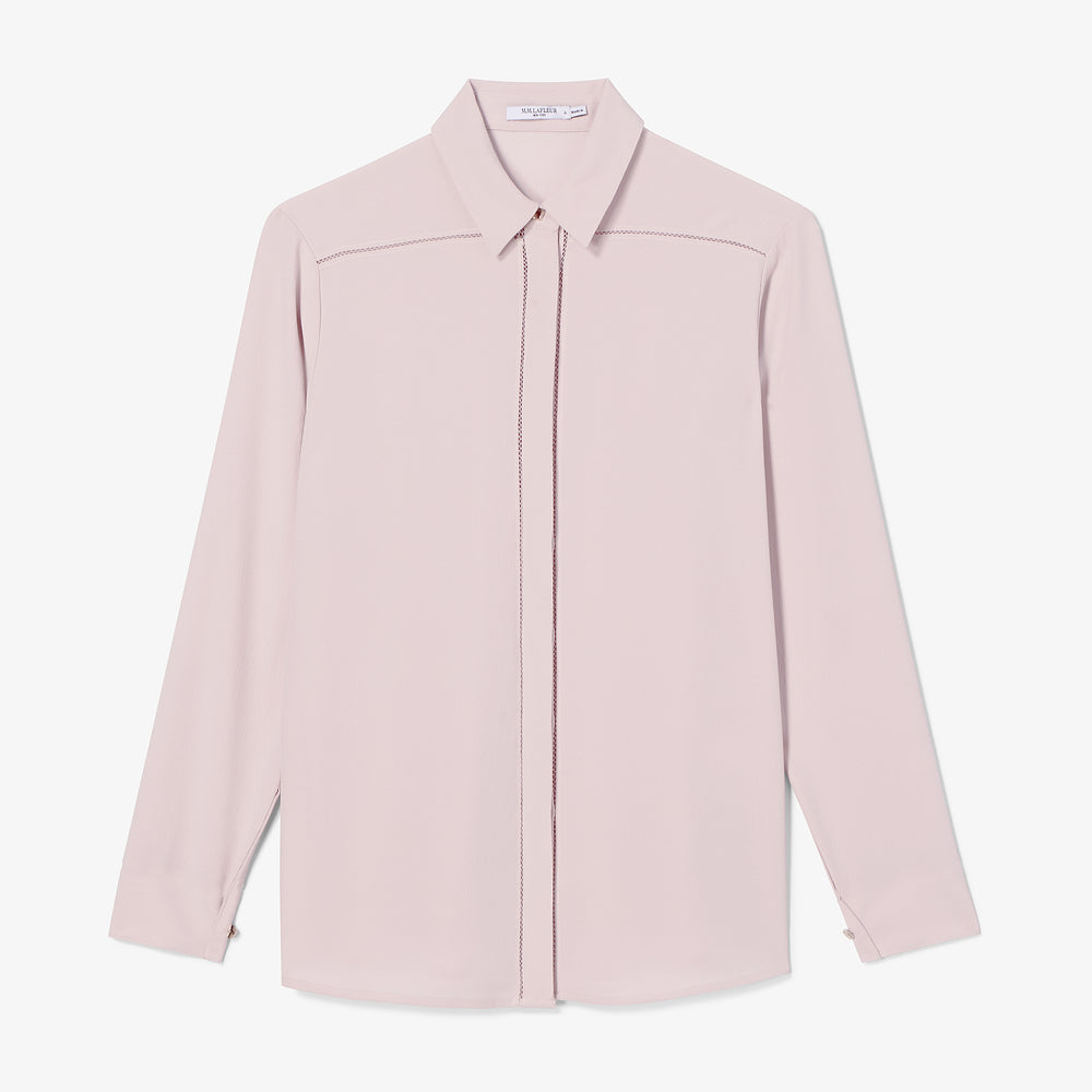Light pink shirt on a white background