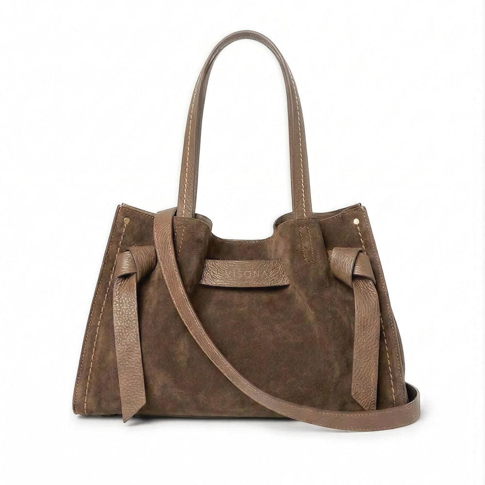 Image of a chocolate brown suede bag