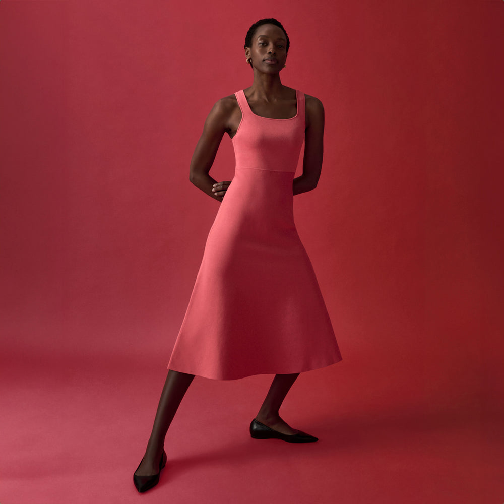 front image of a woman wearing the lottie dress in carnation