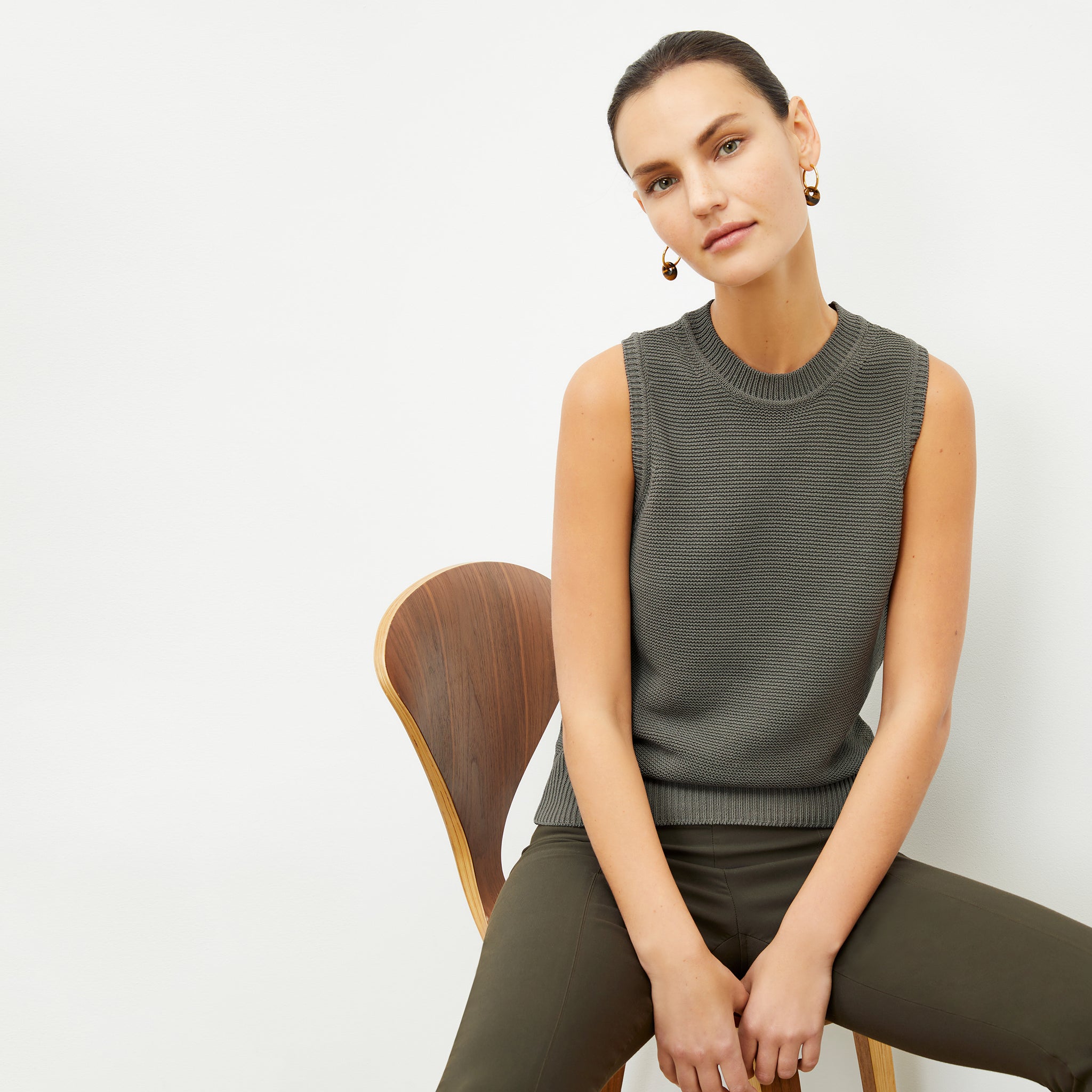 front image of a woman wearing the giada top in fossil 