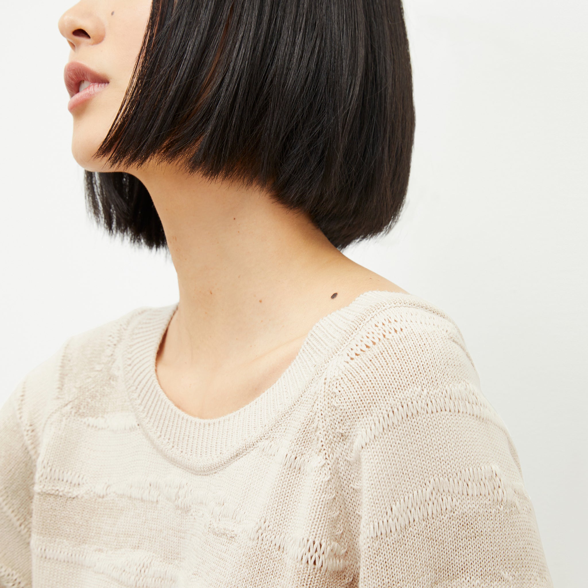 front image of a woman wearing the jo sweater in moonbeam