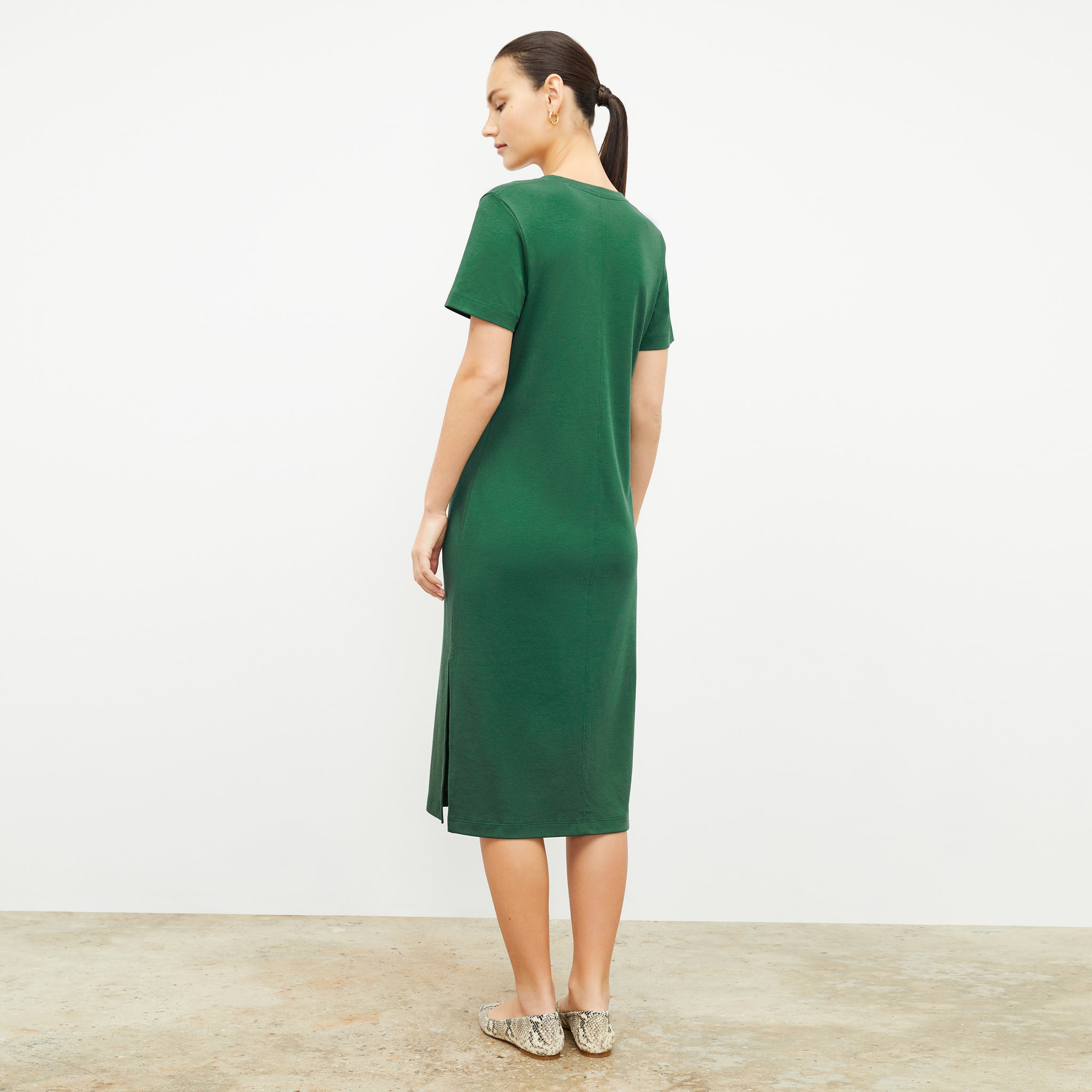 Back image of a woman wearing the renee dress in vine