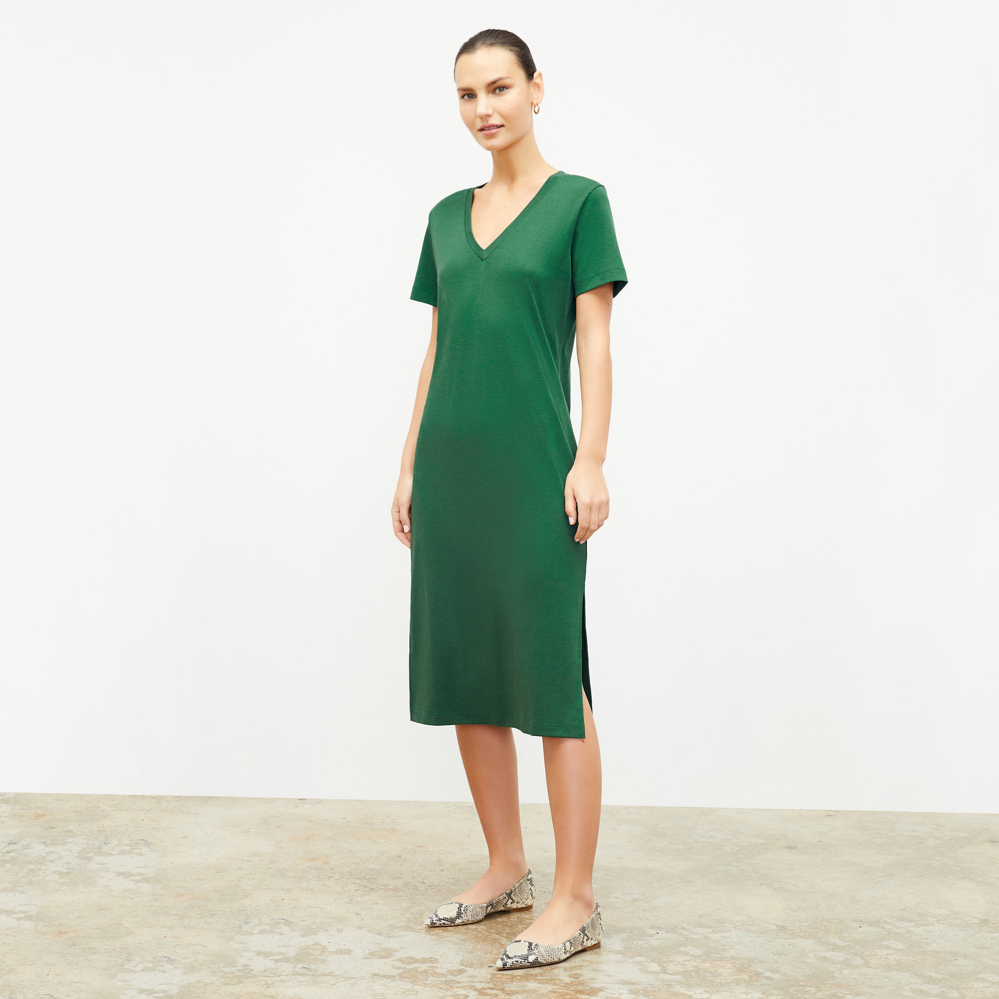 Front image of a woman wearing the renee dress in vine 