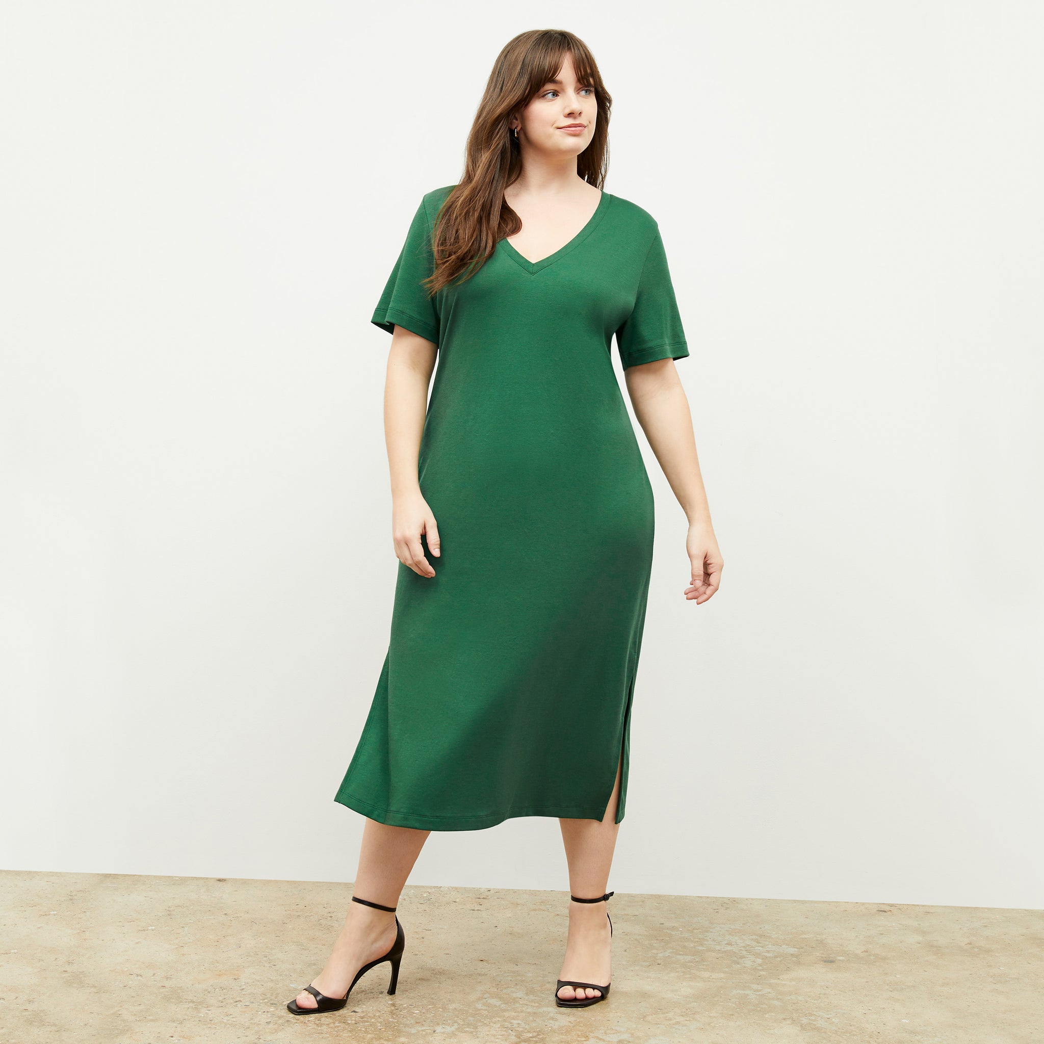 Front image of a woman wearing the renee dress in vine