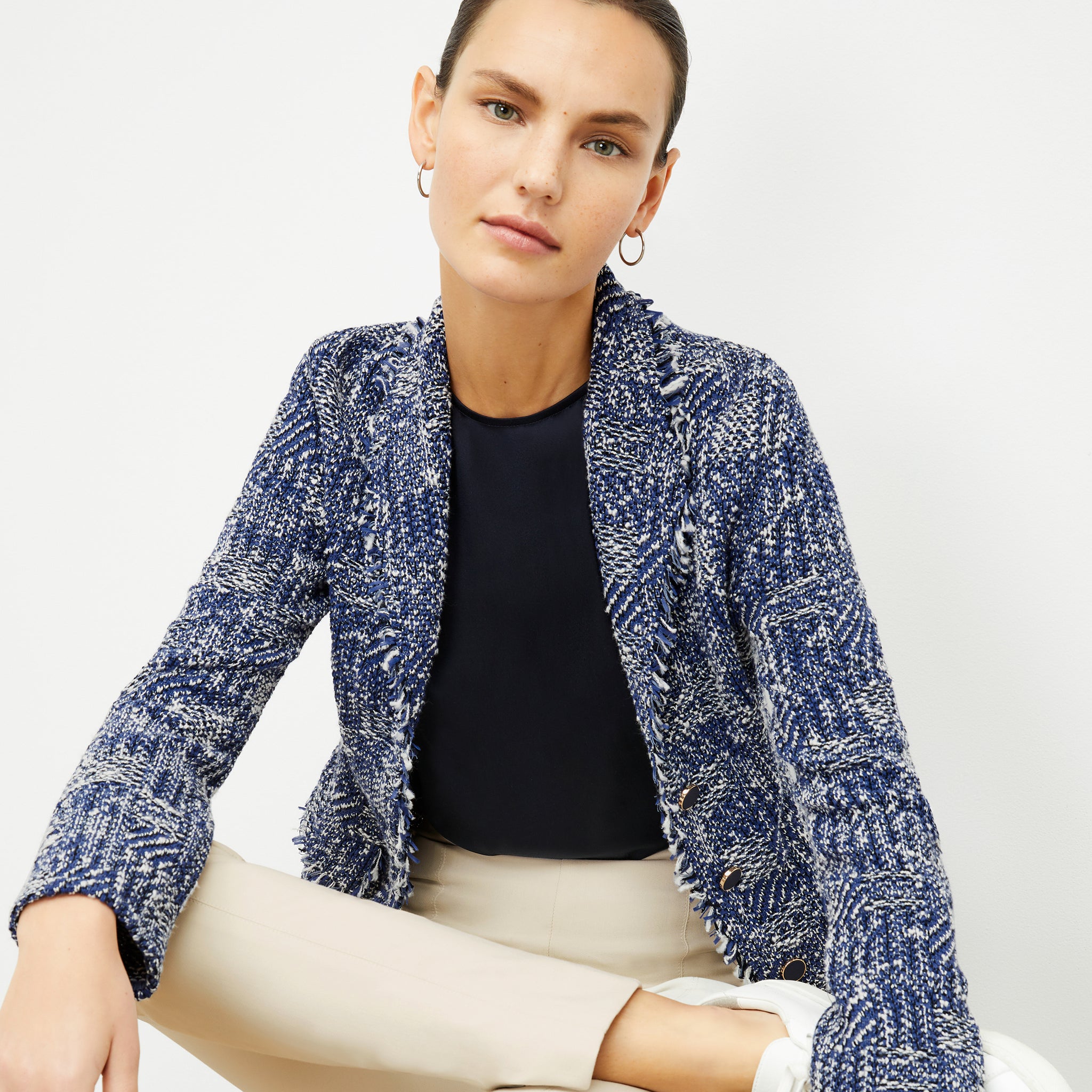 Front image of a woman wearing the Porter Jacket - Interweave in Navy / Ivory