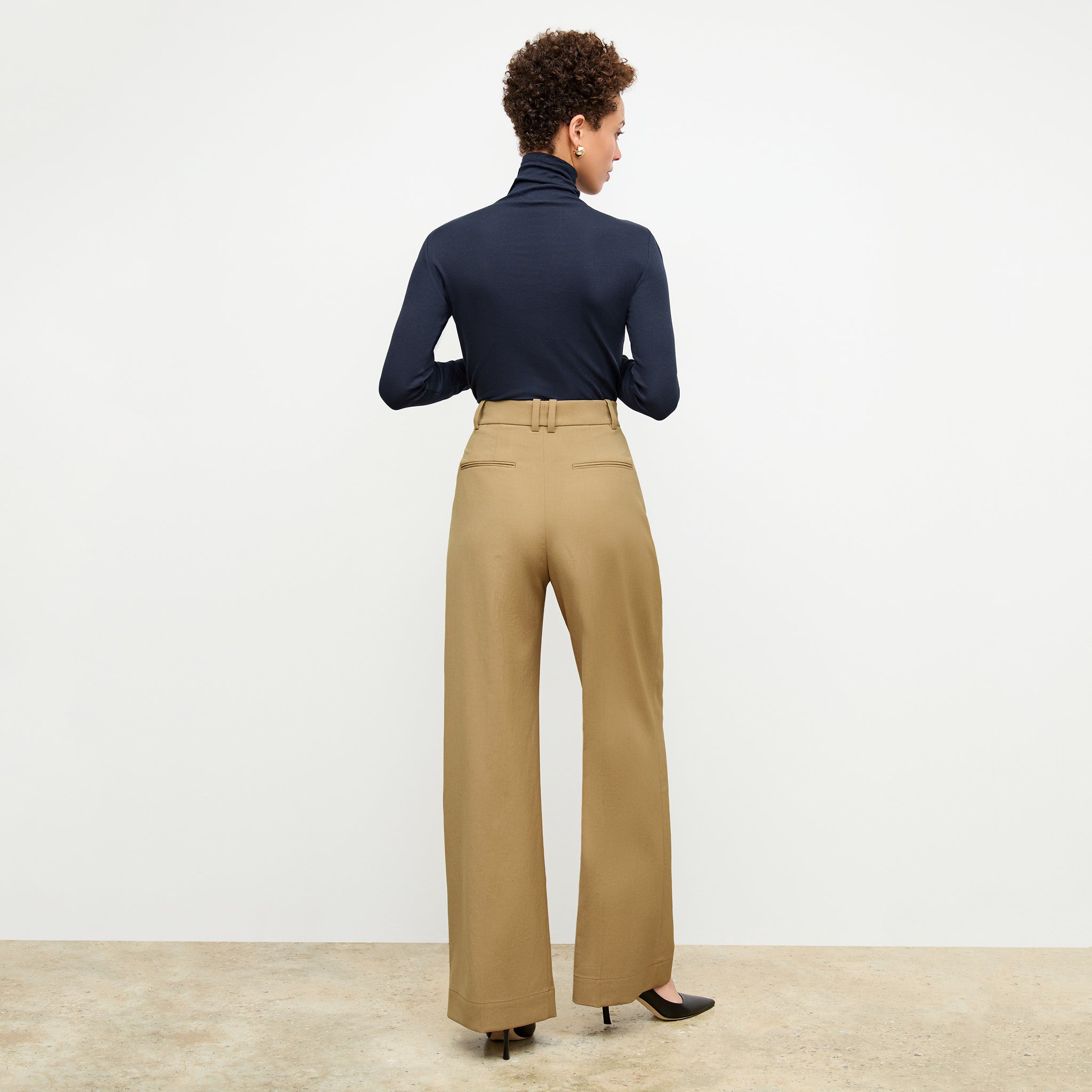 back image of a woman wearing the bia pant in macaroon