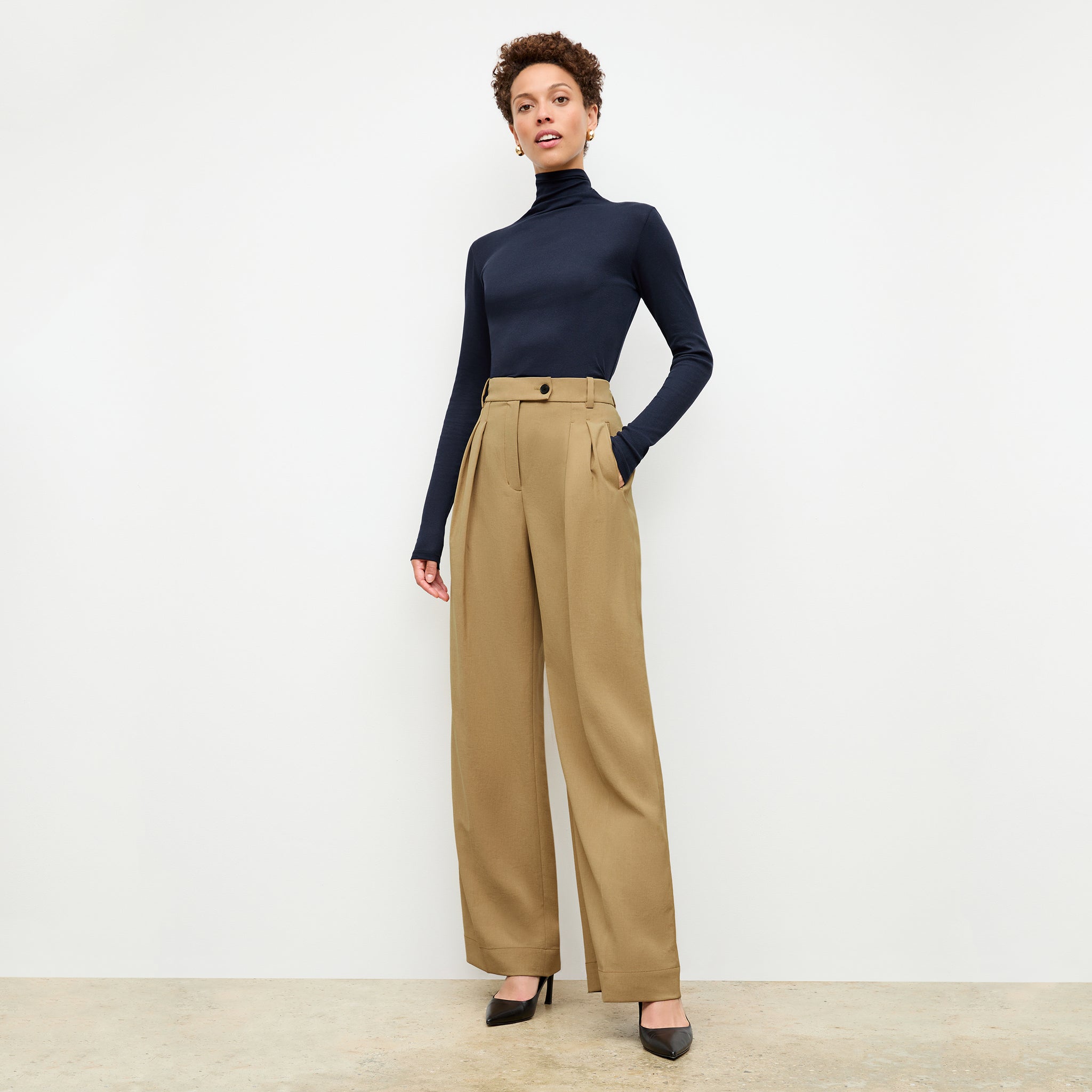 front image of a woman wearing the bia pant in macaroon 